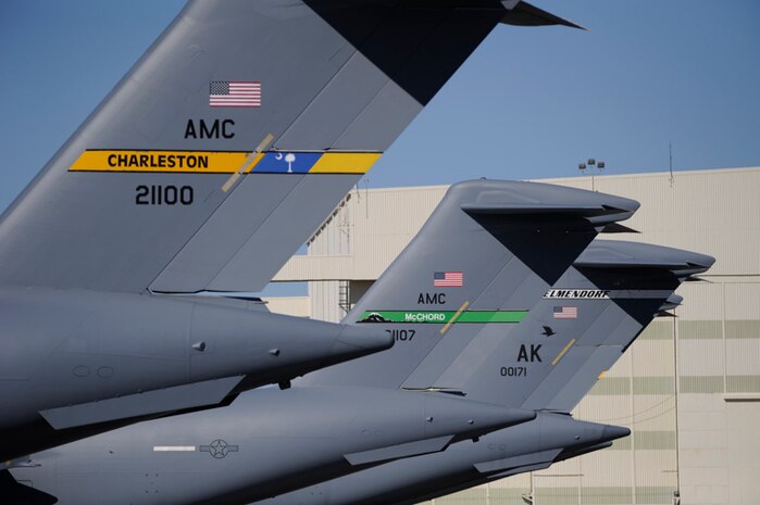 C-17 Globemaster III aircraft from Charleston, McChord and Elmendorf AFB sit on the flightline after participating in relief efforts for Haiti, Jan. 26, 2010. Numerous C-17s land at Charleston AFB as part of a staging process in support of Operation Unified Response. See story page 6. (U.S. Air Force photo by Staff Sgt Michael Zimmerman)