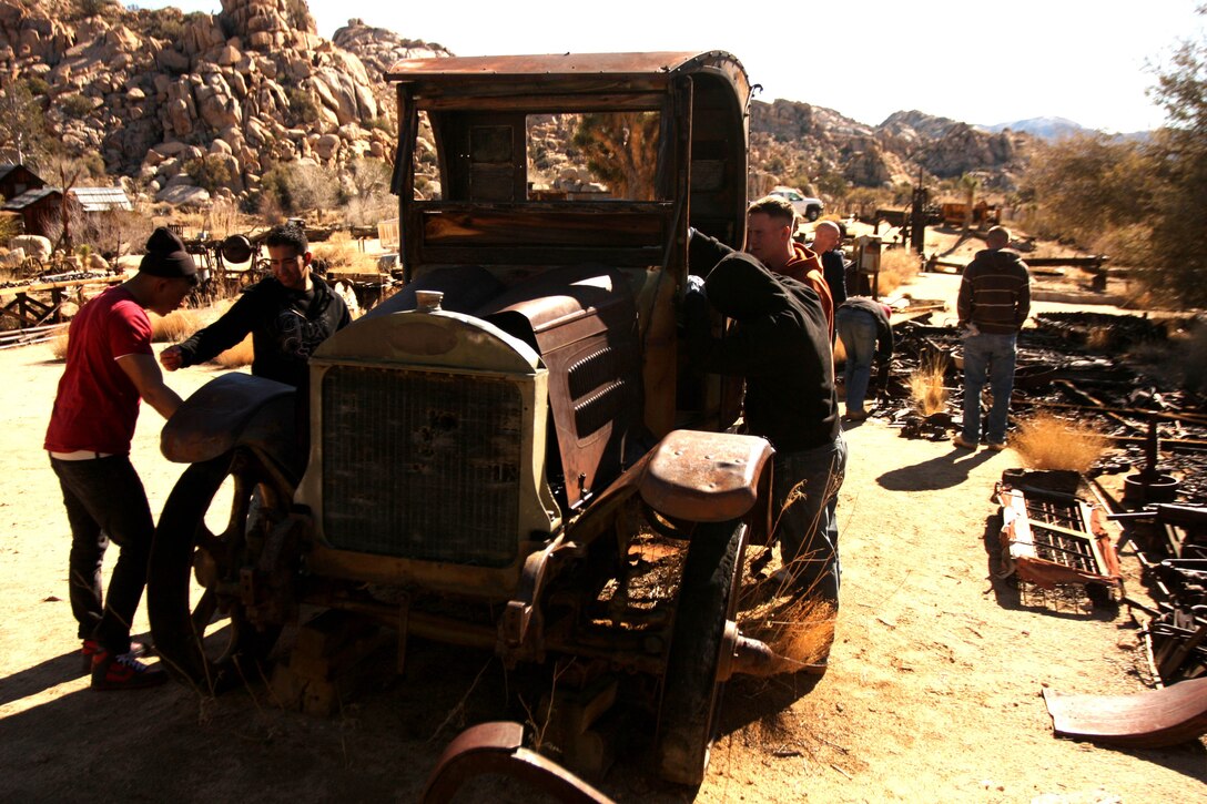 Marines and sailors with 3rd Combat Engineer Battalion, check out a few of the old, rusted cars which dot the landscape of Keys Ranch in Joshua Tree National Park Jan. 28. Ranch visits are only available by appointment Saturdays and Sundays during park ranger-guided tours at 10 a.m. and 1 p.m. from October through May. Weekday scheduling varies and can be checked at the website, http://www.nps.gov/jotr/planyourvisit/programs.html.
