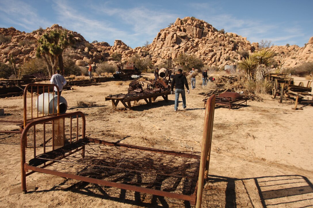 Fourteen Marines and sailors from 3rd Combat Engineer Battalion, spend their day Jan. 28 to helping to restore a cabin which had succumbed to the harsh climate of the Mojave Desert and remove unwanted vegetation from the ranch Jan. 28. This was one of many times service members stationed aboard the Combat Center here volunteered to help preserve the park.