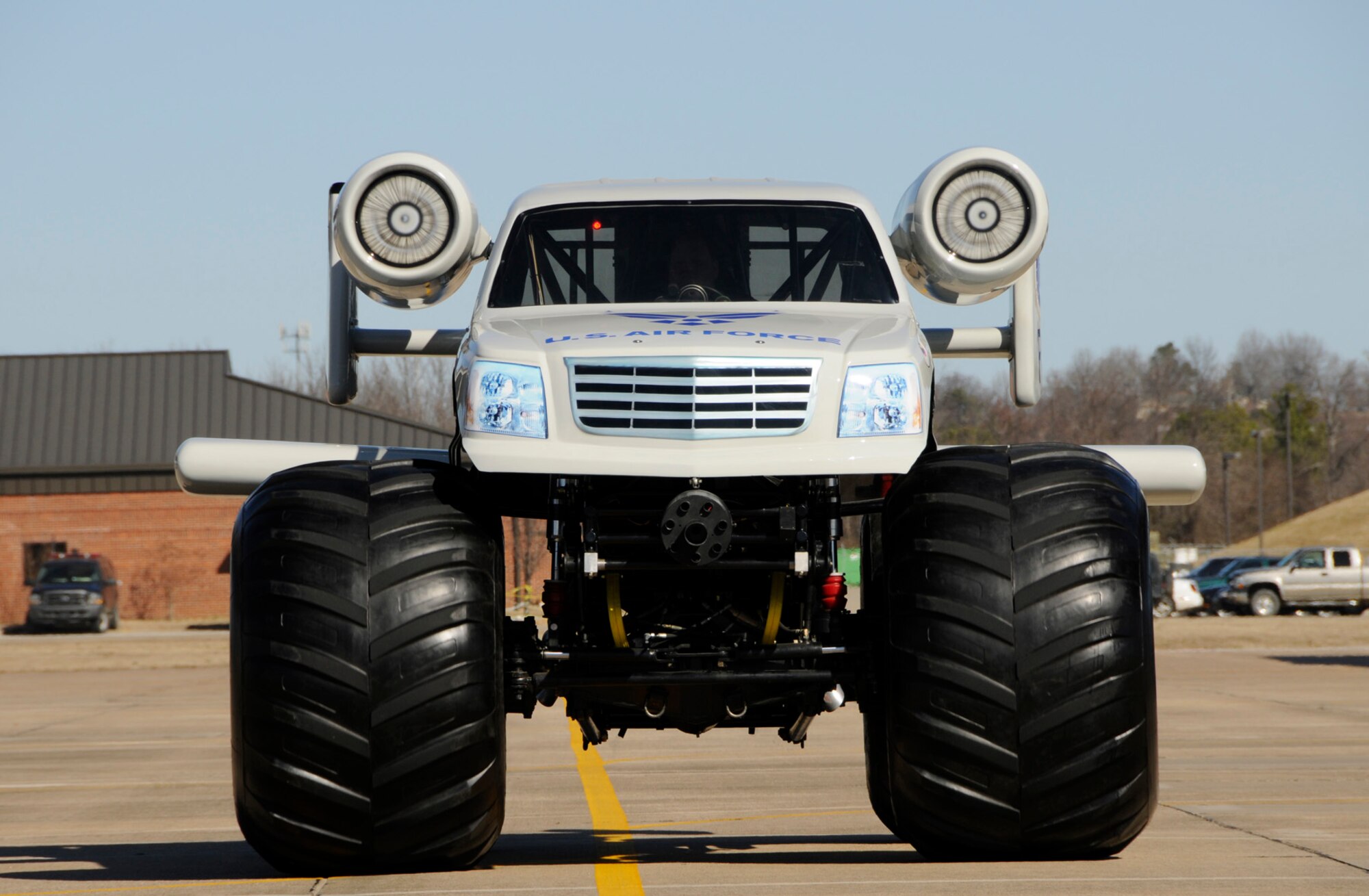 An A-10 monster truck drives down the taxiway on the flightline during a photo and video shoot with U.S. Air Force Recruiting Services Jan. 26, 2010, at the 188th Fighter Wing in Fort Smith, Ark. (U.S. Air Force photo by Capt. Heath Allen/188th Fighter Wing Public Affairs)