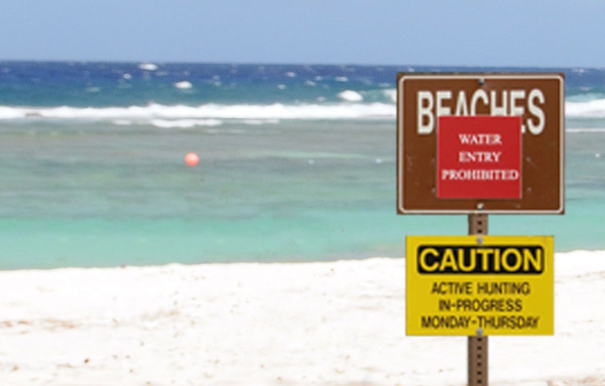 ANDERSEN AIR FORCE BASE, Guam - Beach signs like this one denote whether it's safe to get into the water. All beachgoers should familiarize themselves with signs and take the appropriate measures needed to ensure safety. (U.S. Navy photo illustration by Airman Jeri Moore)