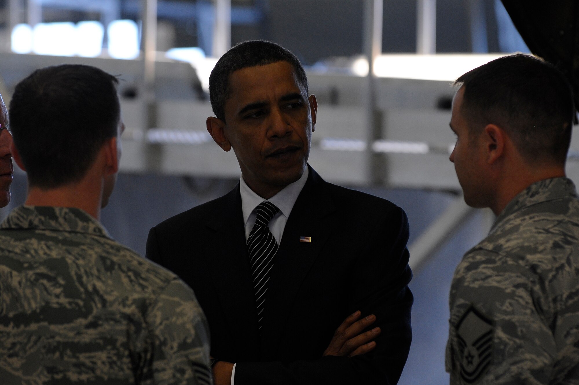 MacDill Air Force Base Airmen explain aircraft maintenance procedures to U.S. President Barack Obama here at MacDill Air Force Base, Fla., Jan. 28, 2010.  President Obama and Vice President Biden landed at MacDill in Tampa, Fla. to conduct a townhall-style meeting at the University of Tampa. (U.S. Air Force photo by Staff Sgt. Joseph L. Swafford/Released)