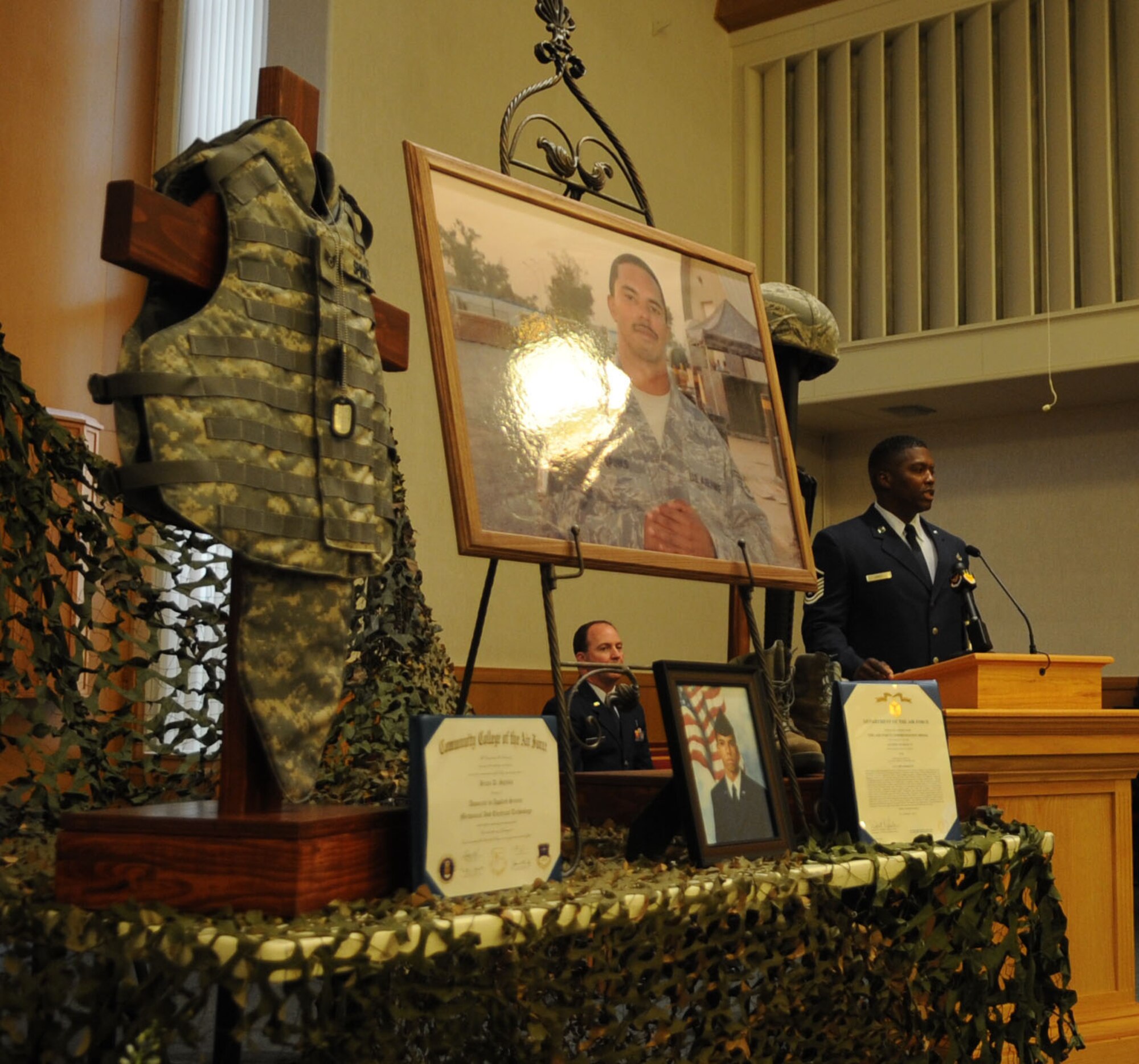 BARKSDALE AIR FORCE BASE, La. – Master Sgt. William Carey speaks during the memorial service honoring Staff Sgt. Brian Spinks at Chapel 2 Jan. 28. The sergeants worked together in the 2d Civil Engineer Squadron. (U.S. Air Force photo by Senior Airman Alexandra M. Longfellow) (RELEASED)