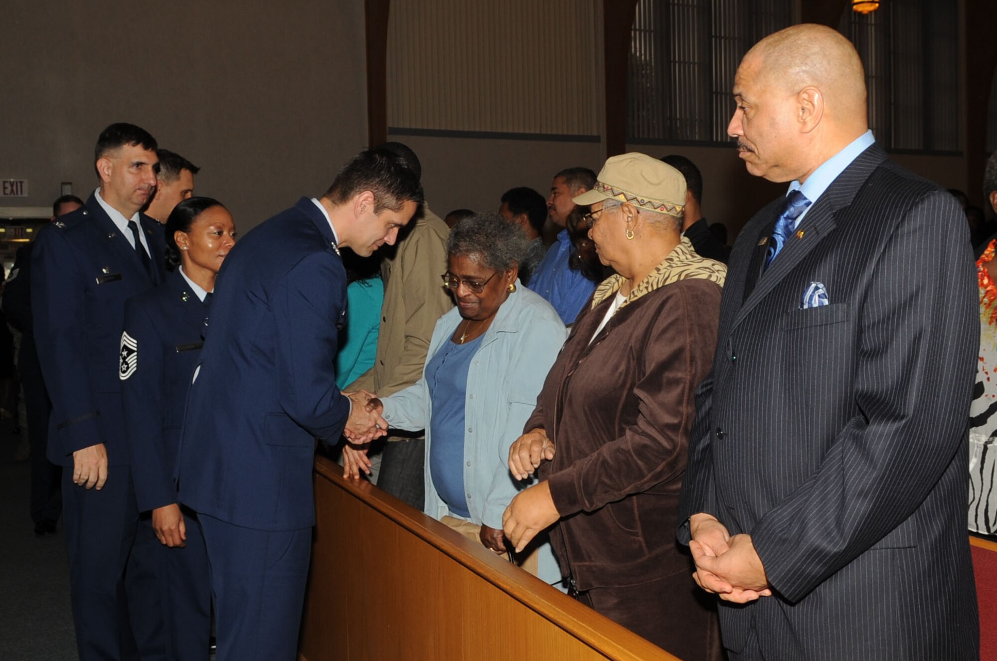 BARKSDALE AIR FORCE BASE, La. – Col. Steven Basham, 2d Bomb Wing commander, gives condolences to family members of Staff Sgt. Brian Spinks, 2d Civil Engineer Squadron, during his memorial service at Chapel 2 Jan. 28. Sergeant Spinks died as a result of an off-base incident Jan. 17. (U.S. Air Force photo by Senior Airman Alexandra M. Longfellow) (RELEASED)