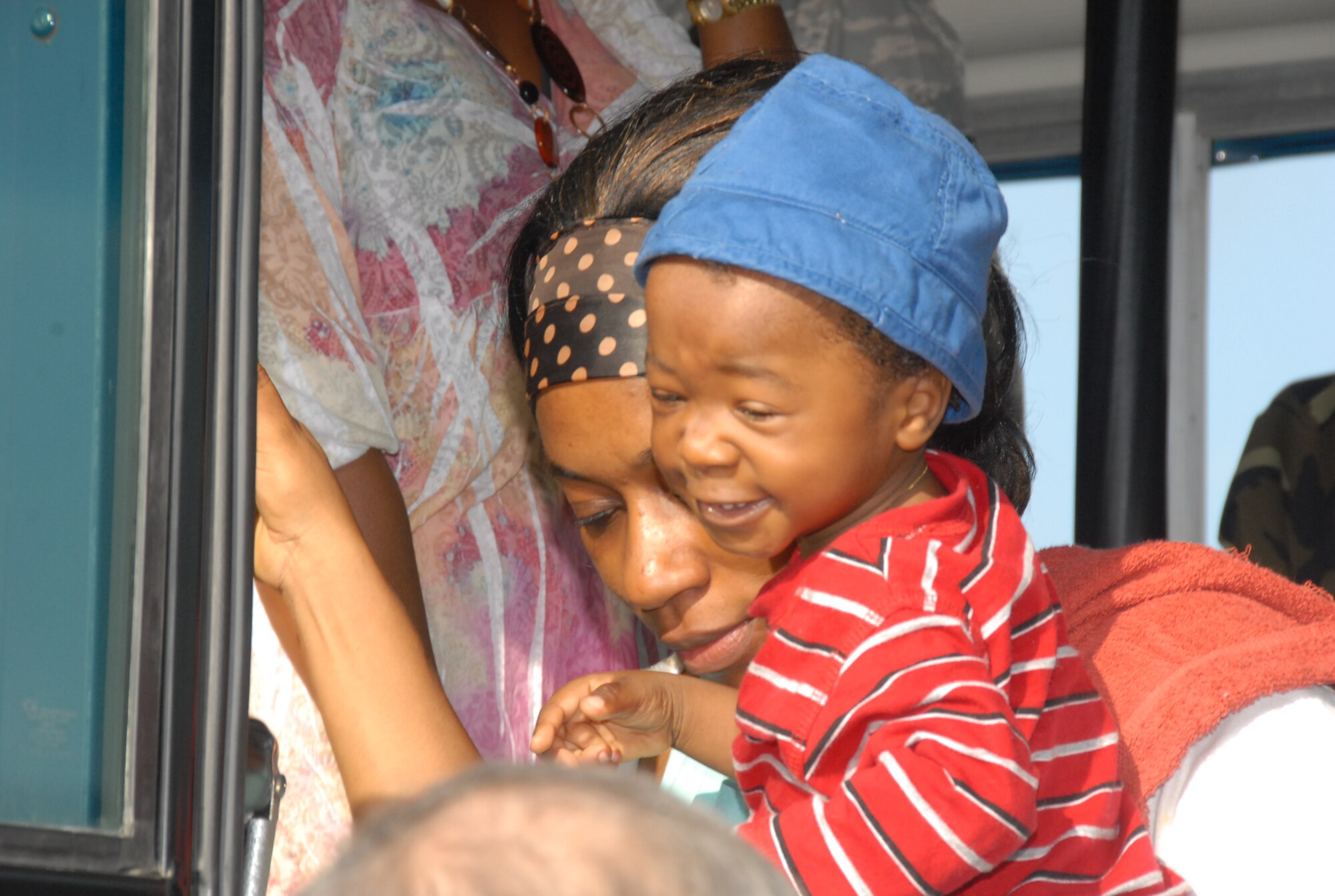 One of the many faces of infants and children that were evacuated from the aftermath of the earthquake that hit Haiti. Both Puerto Rico and Minnesota Air National Guard are providing support under the command for US SOUTHCOM, 35th Expeditionary Airlift Squadron. They are arriving to the Puerto Rico Air National Guard Base from where they will board a Minnesota Air Guard C-130 aircraft and be airlifted to Homestead AFB as part of Operation Unified Response.   (United States Air Force photo by Master Sgt. Anthony Hall)