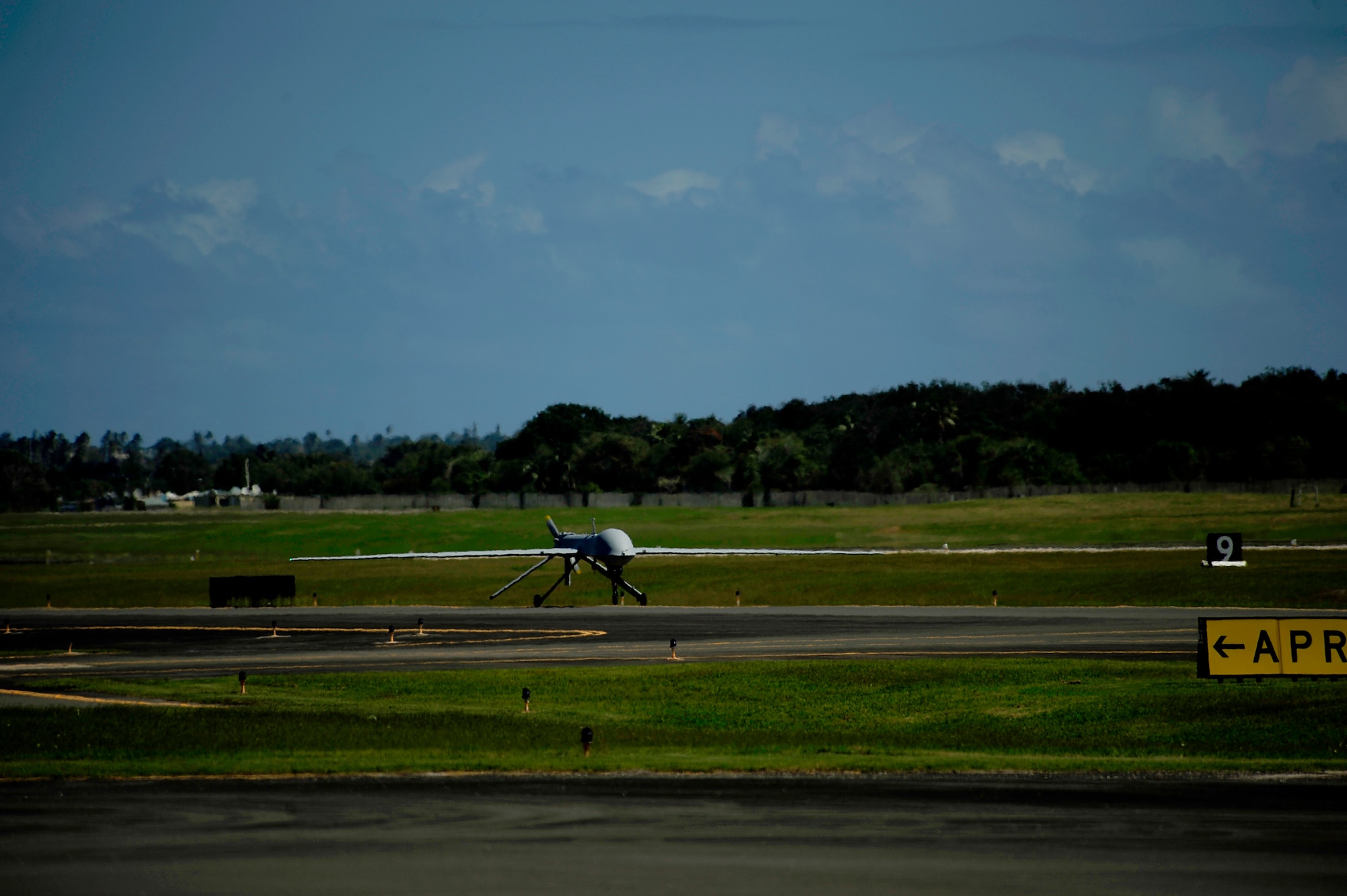 A U.S. Air Force RQ-1 Predator from the 432nd Wing, Creech Air Force Base, Nevada lands at Aeropuerto Rafael Hernandez outside Aguadilla, Puerto Rico on 28 Jan., 2010.  The RQ-1 remotely piloted systems are operating out of Puerto Rico in support of Operation Unified Response in Haiti.  Airmen from Creech Air Force Base, Las Vegas, Nev. are providing 24 hour a day full-motion video in real time to international relief workers on the ground in order to speed humanitarian aid to remote and cut-off areas of the country following the earthquake on 12 Jan., 2010. (U.S. Air Force photo by Tech. Sgt. James L. Harper Jr.)