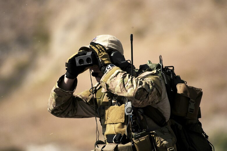 A U.S. Air Force combat controller uses a rangefinder for a drop zone survey outside Port-au-Prince, Haiti, Jan. 24, 2010, during Operation Unified Response. (U.S. Air Force photo/Master Sgt. Jeremy Lock) 