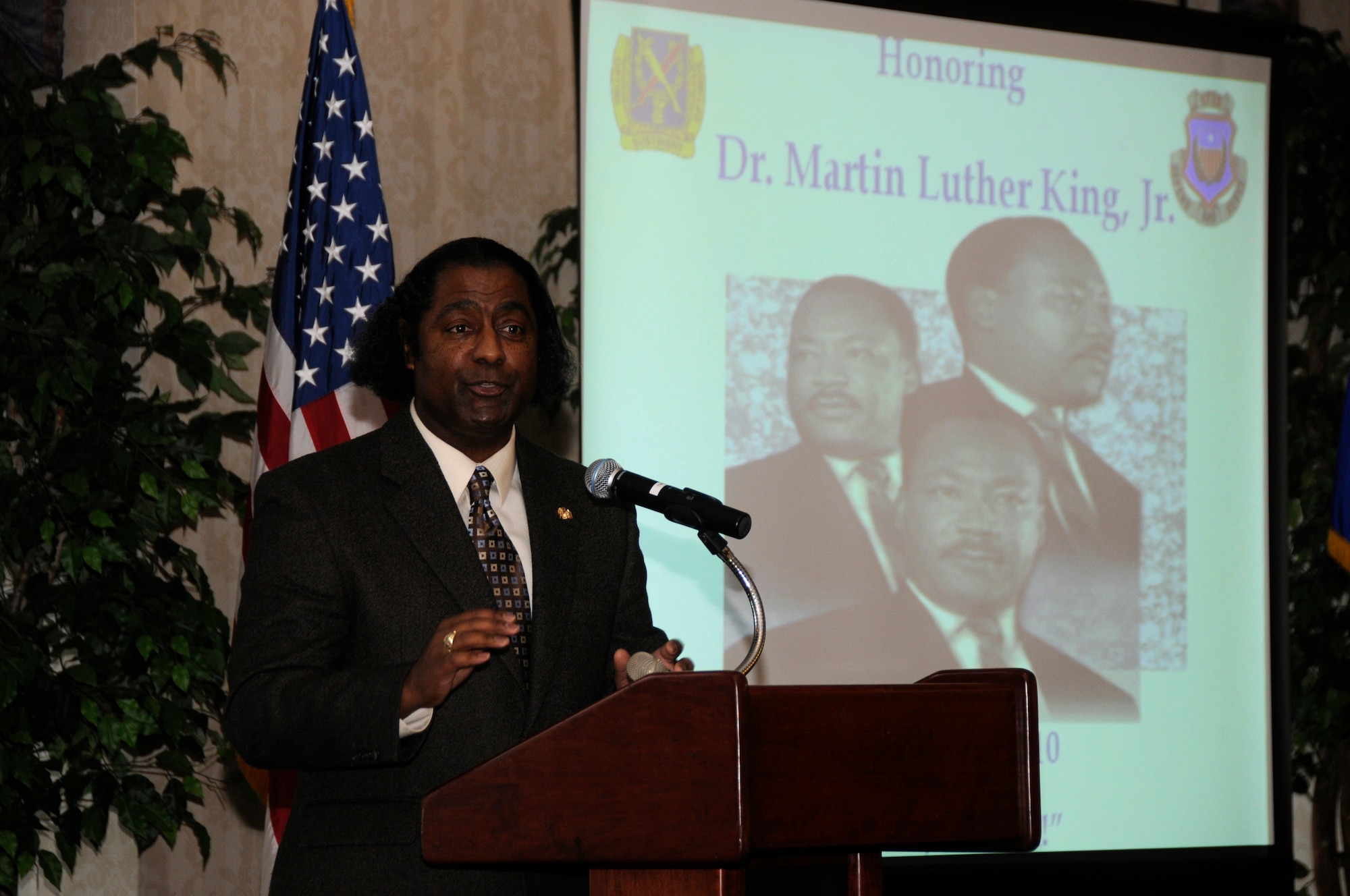 SCOTT AIR FORCE BASE, Ill. -- Retired Command Chief Master Sgt. Bobby Dandringe speaks at a luncheon in honor of Dr. Martin Luther King Jr. at the Scott Club Jan. 20.  Chief Dandringe spoke of the many accomplishments that have resulted from Dr. King’s efforts. The event culminated with a slide show and Tech. Sgt. Albert Williams singing “America the Beautiful.” (U.S. Air Force photo/Staff Sgt. Brian Ellis)
