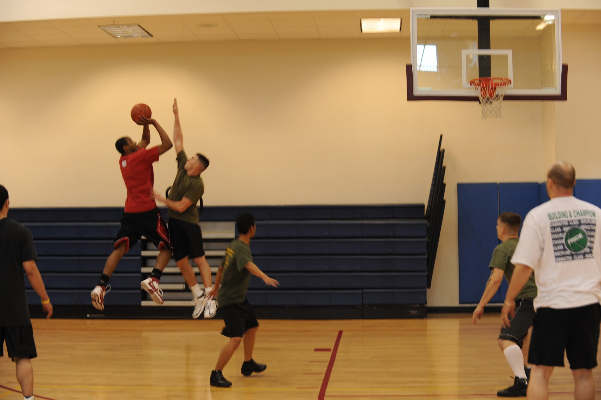 BUCKLEY AIR FORCE BASE, Colo.--Staff Sgt. Alfred Davis, 4th Manpower Requirements Squadron, takes a shot during the 3 on 3 Hoops Classic at the Buckley Fitness Center Jan. 27. (U.S. Air Force by Airman 1st Class Marcy Glass)
