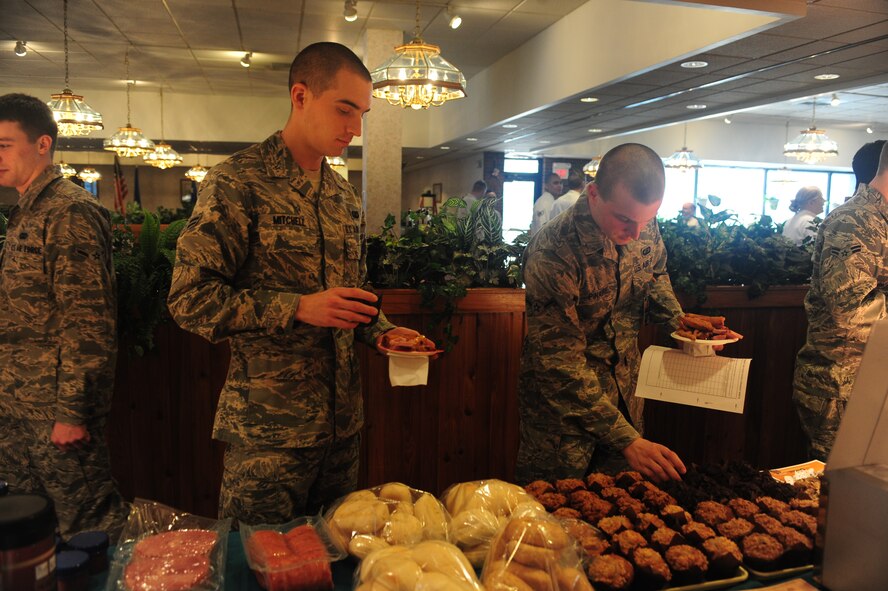 ELLSWORTH AIR FORCE BASE, S.D. -- Airmen sample new items during a taste-testing event at the Bandit Inn Dining Facility, Jan 27.  The Bandit Inn hosted a taste-testing event for Airmen to help them create a new menu. (U.S. Air Force photo/Airman 1st Class Anthony Sanchelli)
