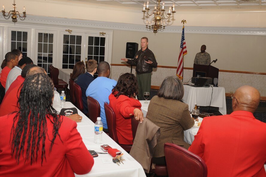 Col. Mark Kelly, 4th Fighter Wing commander, welcomes Youth in Aviation Junior Reserve Officers' Training Corps members to Seymour Johnson Air Force Base, N.C., Jan. 23, 2010. Kelly briefed the crowd on the importance of jet maintenance. The National Tuskegee Airmen Inc. sponsored the visit hosted by the local Wilson V. Eagleson Chapter of Tuskegee Airmen. (U.S. Air Force photo/Senior Airman Whitney Lambert) 