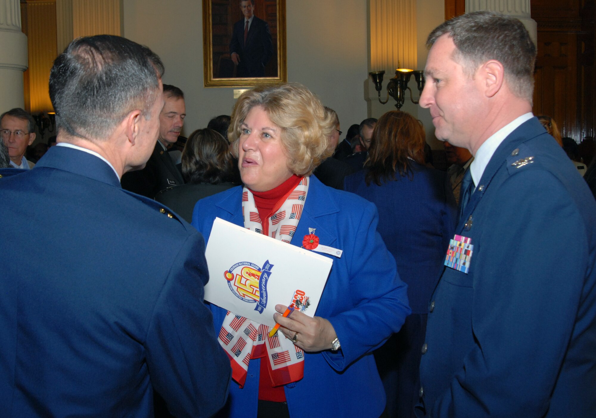 Brig. Gen. Kevin E. Pottinger (left), commander, Air Reserve Personnel Center, and Col. David Zeh, ARPC vice commander, meet Colorado State Representative Nancy Todd during Military Appreciation Day at the Capitol on January 25. Military members from throughout Colorado, including eight Airmen from ARPC, were guests on the House floor and gallery at the state capitol in Denver during the event. (U.S. Air Force photo/Dwayne Beuthel)