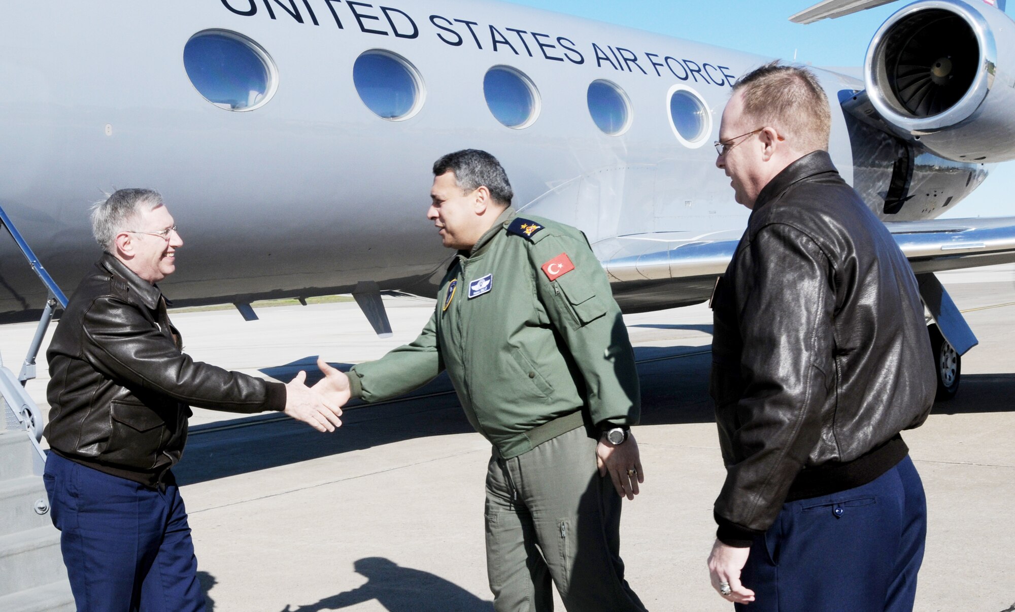 Turkish air force Brig. Gen. Haluk Selvi (middle) and Col. Eric Beene (right) welcome Gen. Roger A. Brady to Incirlik Air Base, Turkey Jan. 25, 2010. General Brady and Chief Master Sgt. Pamela Derrow visited the base Jan. 25 through 26, 2010. General Selvi is the 10th Tanker Base commander. Colonel Beene is the 39th Air Base Wing commander. General Brady is the U.S. Air Forces in Europe commander. Chief Derrow is the USAFE command chief. (U.S. Air Force photo/Senior Airman Ashley Wood)