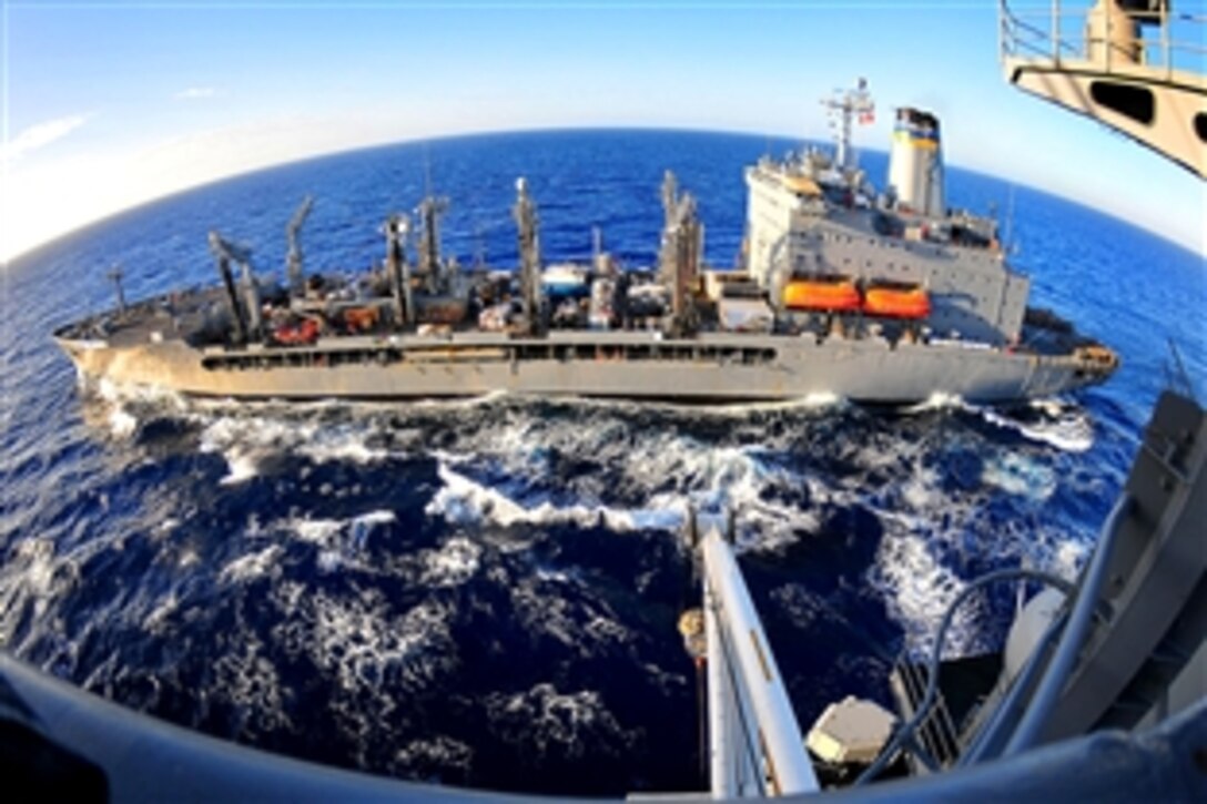 The fleet replenishment oiler USNS Big Horn pulls alongside the aircraft carrier USS Carl Vinson during a connected replenishment in the Atlantic Ocean, Jan. 27, 2010. The Carl Vinson is supporting humanitarian and disaster relief operations in Haiti following a devastating earthquake.
