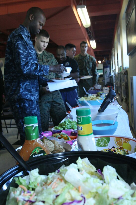 Service memebers learned  how to use their microwaves to cook healthy foods during a microwave cooking class at the Great Escape Jan. 28. The class is offered by Semper Fit and The Great Escape.