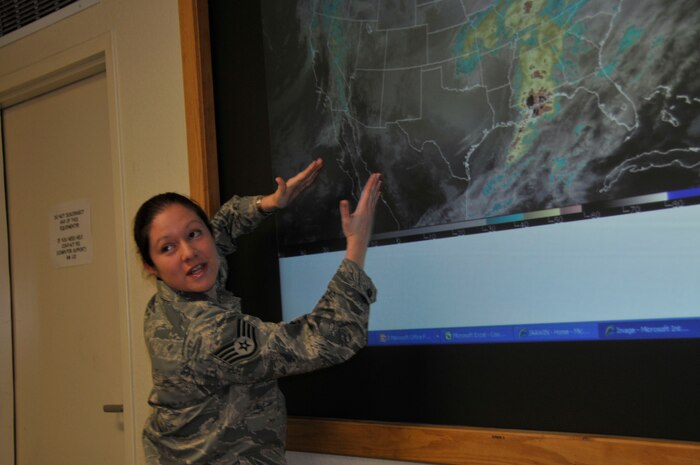 NELLIS AIR FORCE BASE, Nev.-- Staff Sgt. CeCe Ybarra, Red Flag weather forecaster deployed from the 48th Operations Support Squadron at RAF Lakenheath, England, briefs Red Flag 10-2 aircrew prior to their missions. Sergeant Ybarra provides weather support for more than 1,200 servicemembers from the United States and United Kingdom. (U.S. Air Force photo by Tech. Sgt. Chris Stagner)