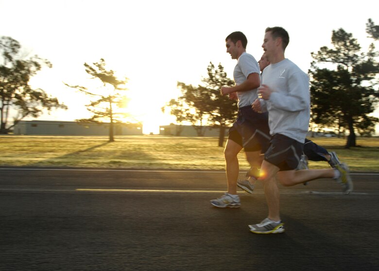 VANDENBERG AIR FORCE BASE, Calif. -- A rising sun greets Vandenberg's runners during the 30th Space Wing's Fit-to-Fight Run here Friday, Jan. 29, 2010. At the end of each month, Airmen complete a three-mile course around the base during the wing run here. (U.S. Air Force photo/Airman 1st Class Lael Huss)