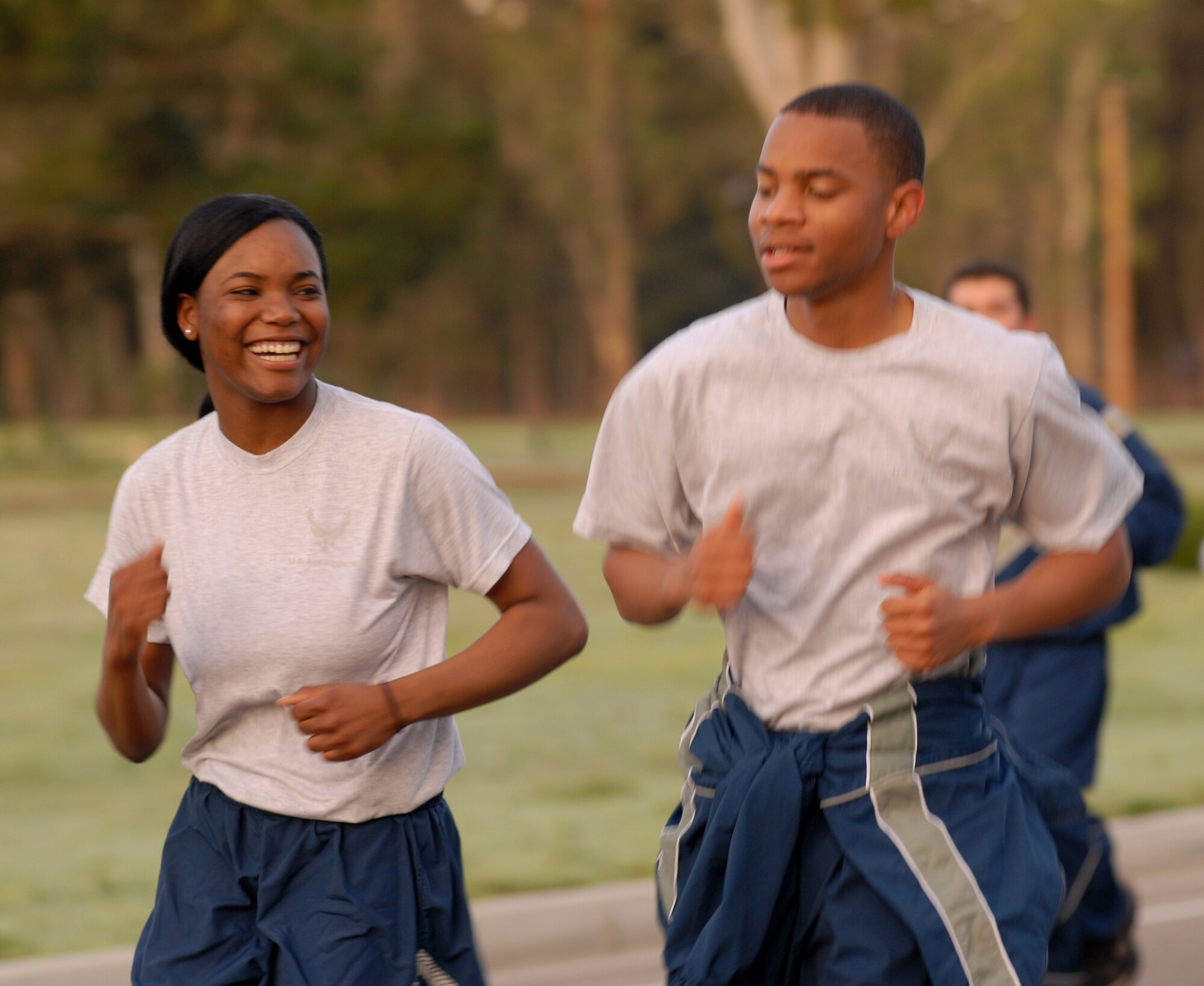 VANDENBERG AIR FORCE BASE, Calif. -- Members of Team V come together during the wing run to motivate one another to finish strong Friday, Jan. 29, 2010, here. Airmen in the 30th Space Wing run together every month, showing the fit-to-fight force on base. (U.S. Air Force photo/Airman 1st Class Kerelin Molina)