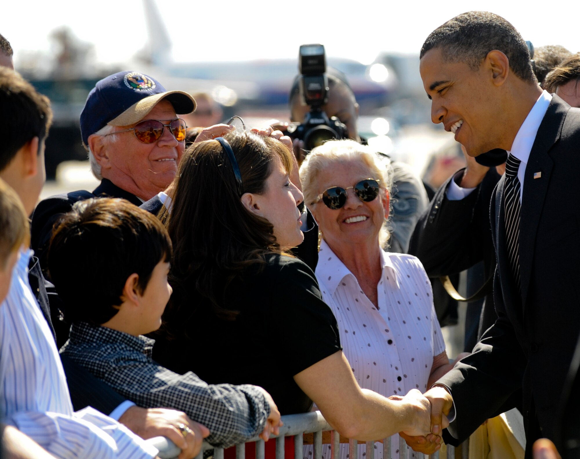U.S. President Barack Obama greets the crowd during his visit to MacDill Air Force Base, Fla., Jan. 28, 2010.  President Obama and Vice President Biden landed at MacDill in Tampa, Fla. to conduct a townhall-style meeting at the University of Tampa. (U.S. Air Force photo by Staff Sgt. Joseph L. Swafford/Released)
