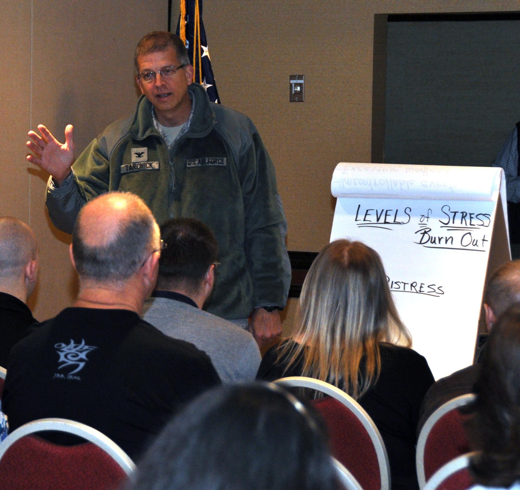 Col. Tim Tarchick, 934th AW commander, doesn?t let stress burn him out as he speaks to Airmen and their families at the Yellow Ribbon reintegration event Jan. 23 at The Grand Rios Resort in Brooklyn Park. The event provided information and activities for more than 80 returning military deployers and 150 family members . (Air Force Photo/Capt. S.J. Brown)