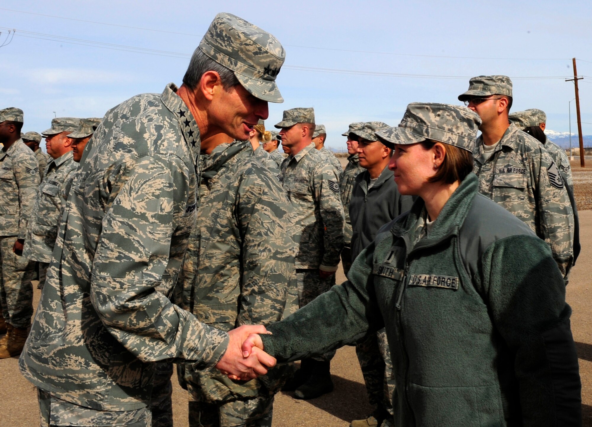 HOLLOMAN AIR FORCE BASE, N.M. -- Air Force Chief of Staff Gen. Norton Schwartz shakes hands with 2nd Lt. Victoria Smith, 49th Material Maintenance Support Squadron, Jan. 27. General Schwartz visited Holloman to see Airmen and operations first-hand. (U.S. Air Force photo by Senior Airman Tiffany Trojca)