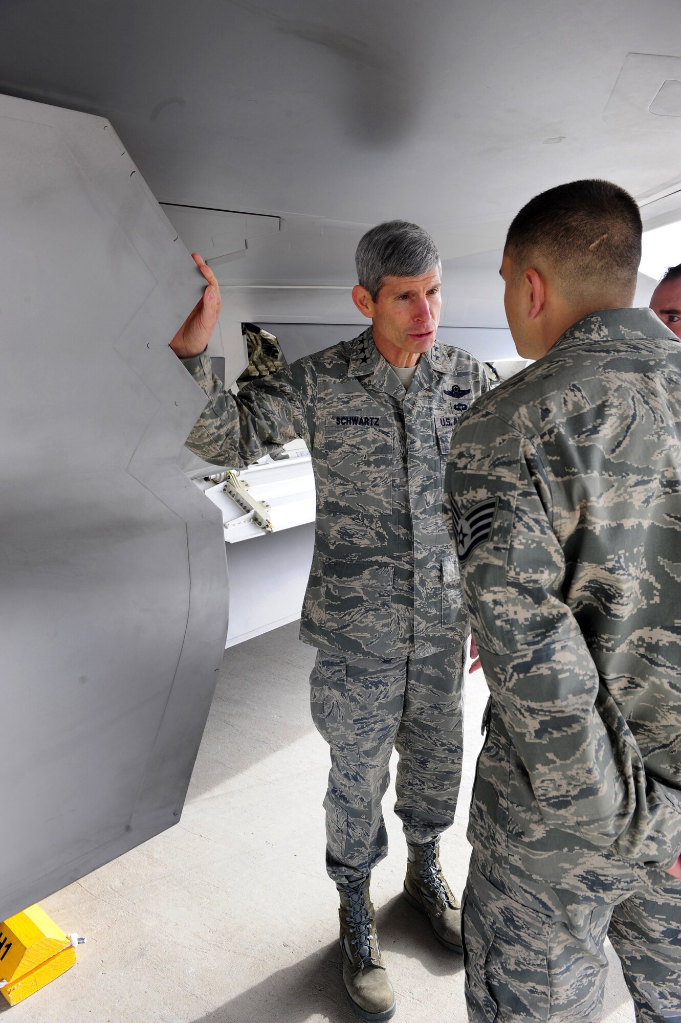 HOLLOMAN AIR FORCE BASE, N.M. -- Air Force Chief of Staff Gen. Norton Schwartz speaks with an F-22A Raptor crew chief, Jan. 27. General Schwartz visited Holloman to see Airmen and operations first-hand. (U.S. Air Force photo by Senior Airman Tiffany Trojca)