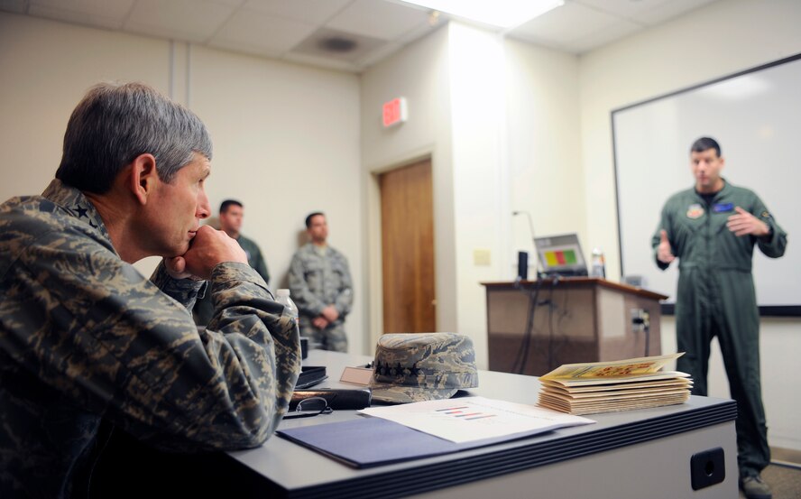 HOLLOMAN AIR FORCE BASE, N.M. -- Air Force Chief of Staff Gen. Norton Schwartz listens to Lt. Col. Mike Hernandez, 7th Fighter Squadron commander, during an F-22 Raptor briefing, Jan. 27. General Schwartz visited Holloman to see Airmen and operations first-hand. (U.S. Air Force photo by Airman 1st Class Veronica Stamps)