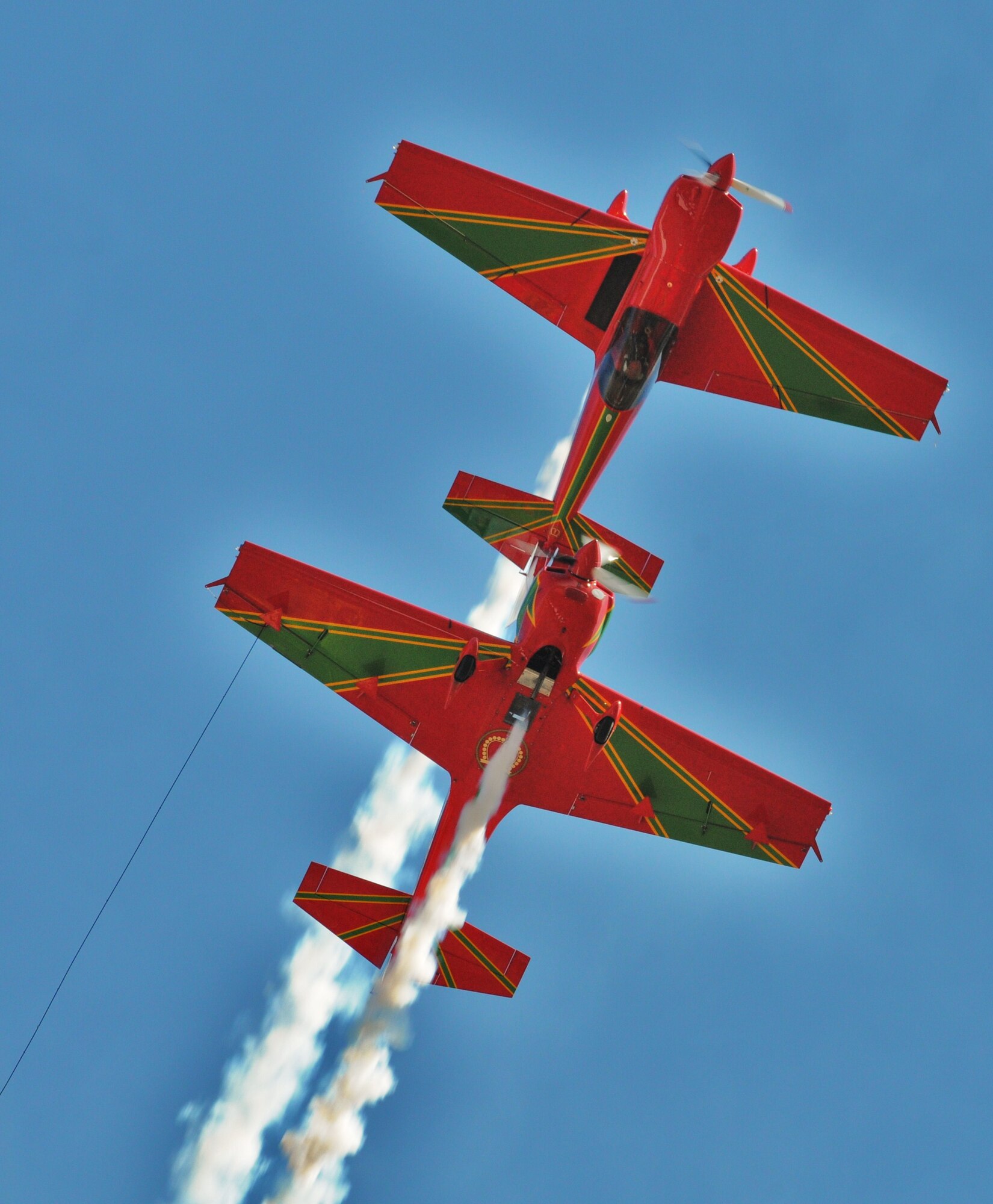 MARRAKECH, Morocco -- Two CAP 232 aircraft from the Royal Moroccan Air Force aerobatics display team, the Green March, fly together during an airial demonstration Jan. 27. The Morocco Aeroexpo will run from Jan. 27 -30, which includes airial demonstrations from an F-16 Fighting Falcon from the 169th Fighter Wing, South Carolina Air National Guard. (U.S. Air Force photo by Staff Sgt. Stefanie Torres)