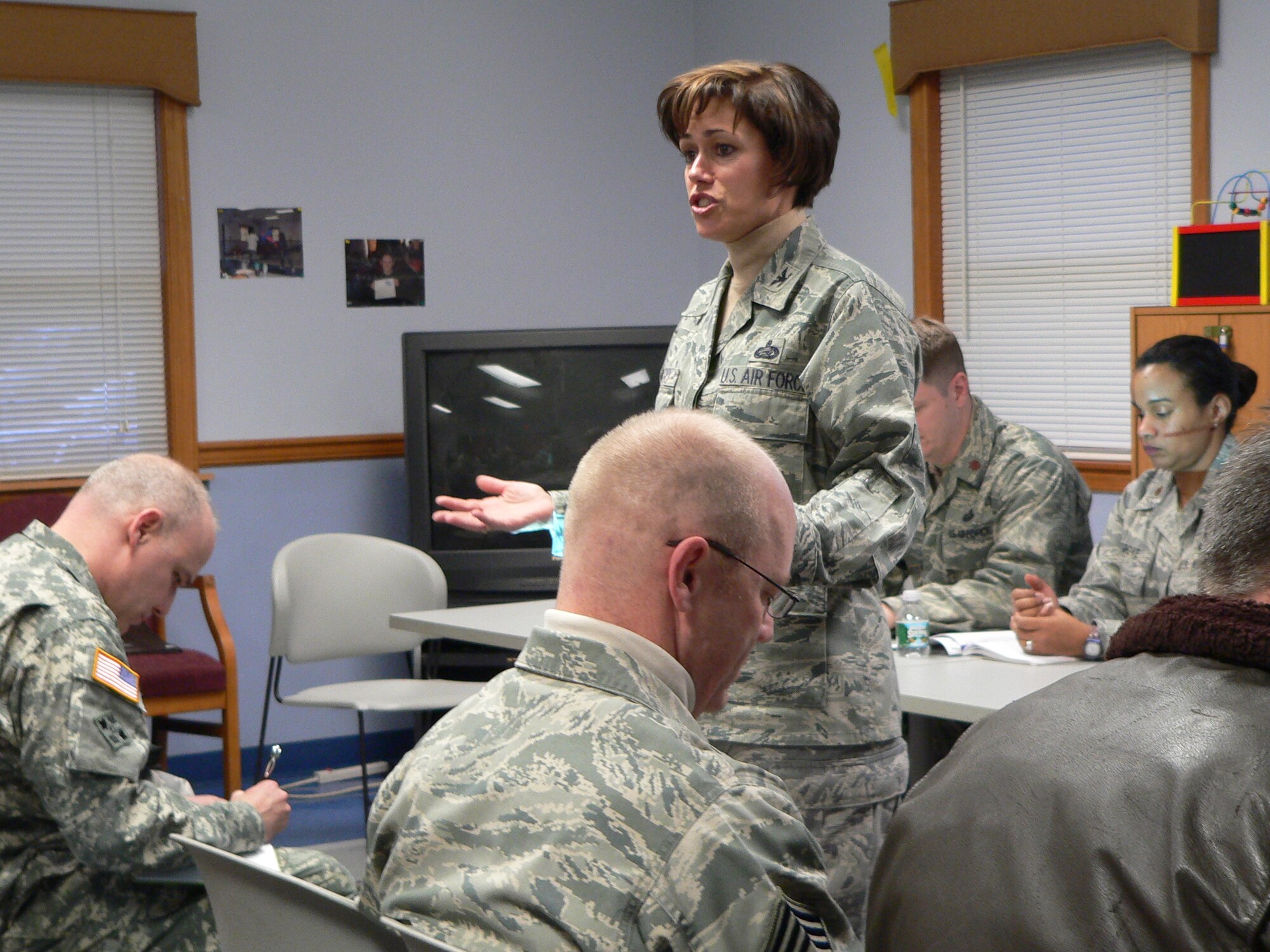 JB MDL and 87th Air Base Wing Commander Col. Gina Grosso answers a question at Lakehurst's Town Hall on Jan. 14. (Air Force photo by Steve Snyder)