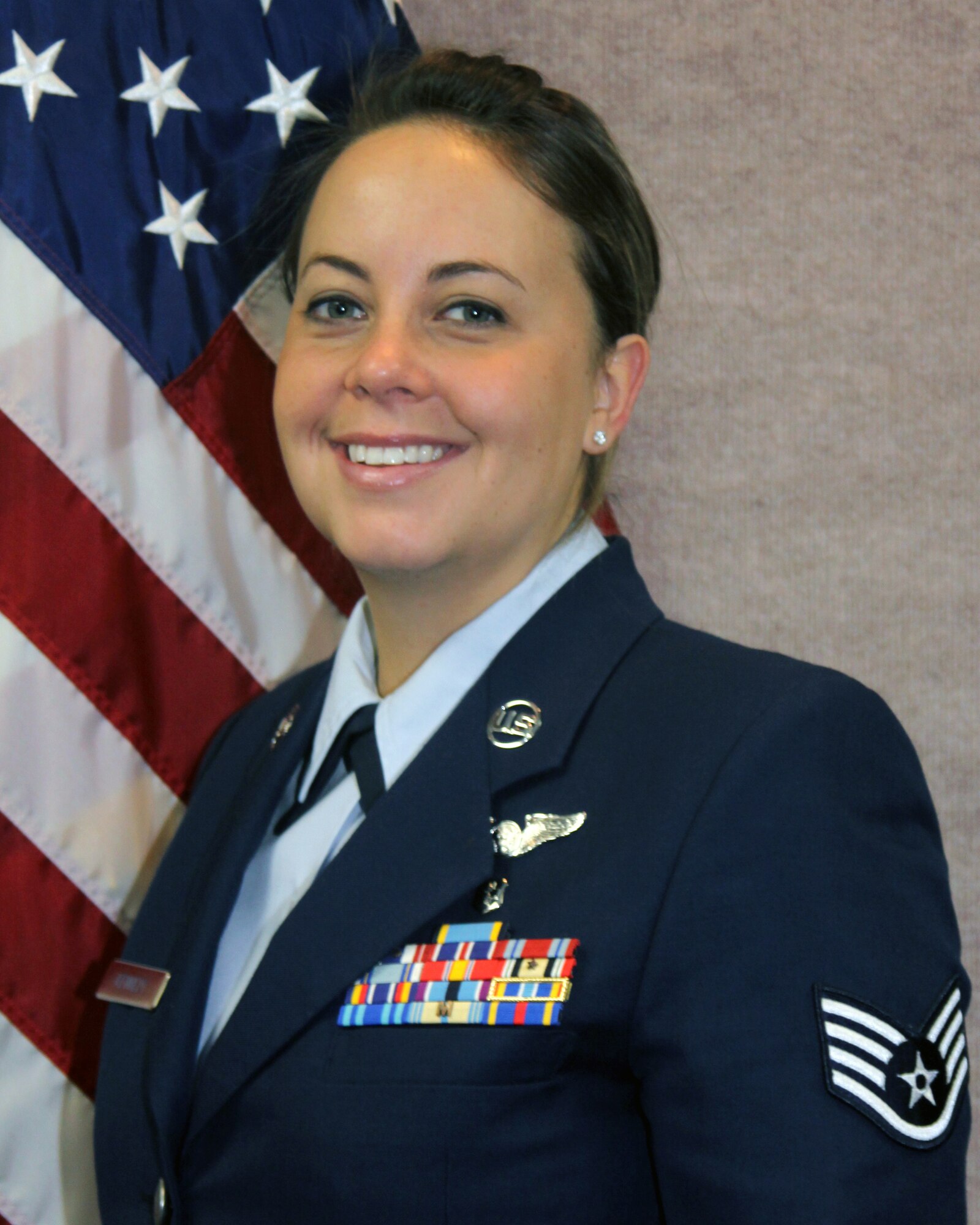 WRIGHT-PATTERSON AIR FORCE BASE, Ohio - Staff Sgt. Emily Kennedy, 445th Aeromedical Evacuation Squadron, is the 2009 Air Force Sergeants Association Reserve Member of the Year.  She was presented with this award at the AFSA annual awards banquet Jan. 23 for her outstanding contributions both on and off duty to include; receiving the Armed Forces Humanitarian Service Medal and spending her off-duty time transporting injured Airmen to their appointments while deployed to Iraq. (U.S. Air Force photo/Bill Richard)