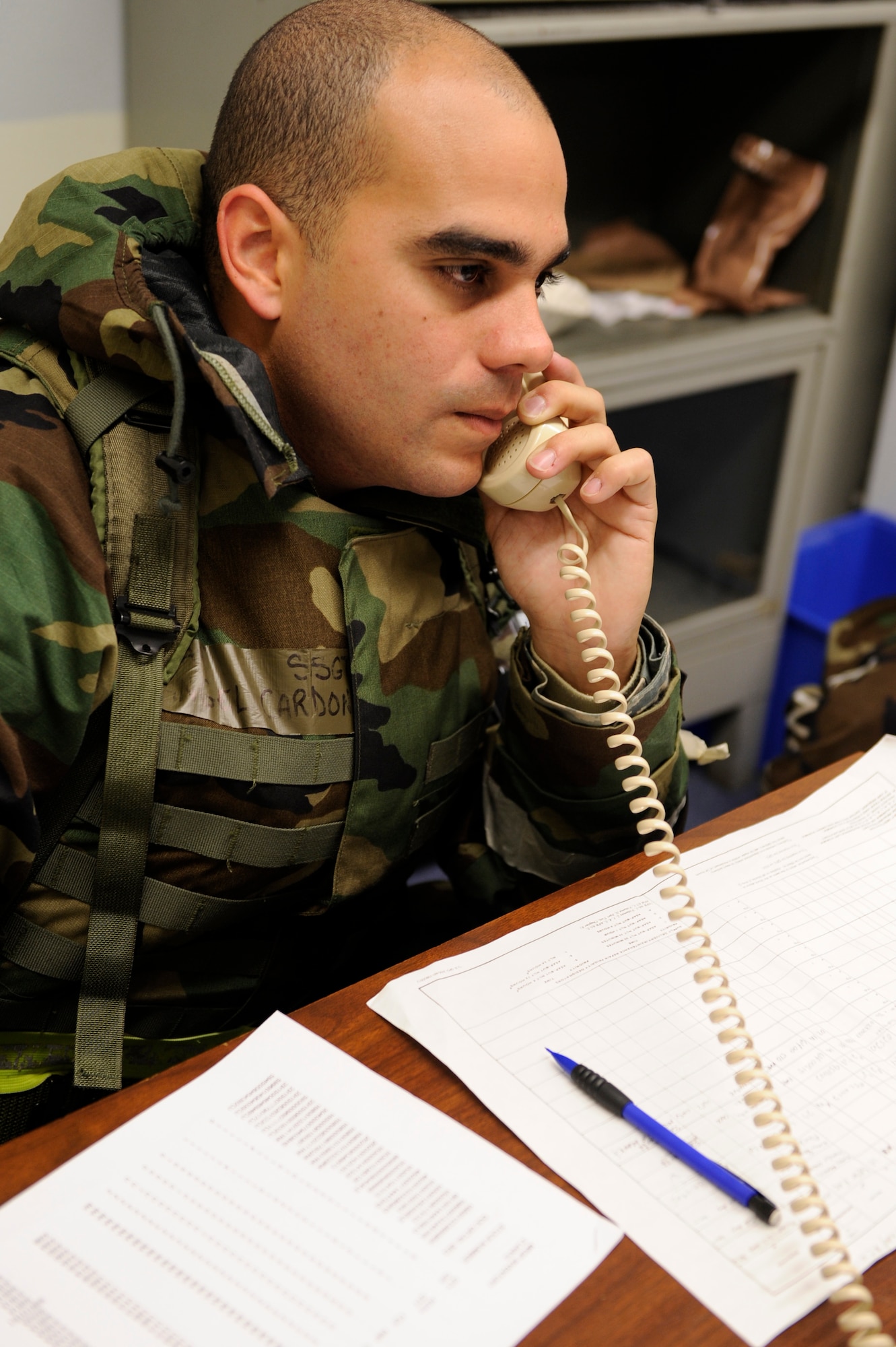 SCOTT AIR FORCE BASE, Ill. – Staff Sgt. Angel Cardona, 156th Logistics Readiness Squadron supply journeyman, calls in a mission capable report January 25, 2010, to the Installation Control Center of an aircraft that needs maintenance parts during the Operational Readiness Exercise held at Volk Field Combat Readiness and Training Center, Wis. During the ORE Airmen were able to work on fine-tuning their combat skills in preparation for the Operational Readiness Inspection in March. (U.S. Air Force photo/Senior Airman Wesley Farnsworth) 