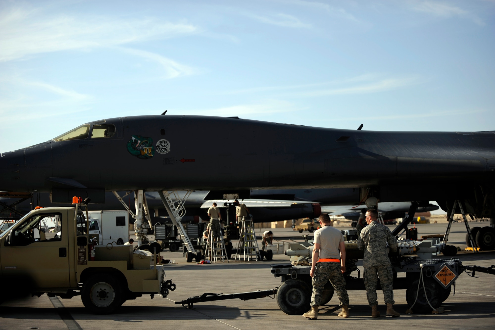 Airmen assigned to the 37th Aircraft Maintenance Unit load bombs on a B-1B Lancer Jan. 23, 2010, in Southwest Asia. (U.S. Air Force photo/Staff Sgt. Manuel J. Martinez/Released)