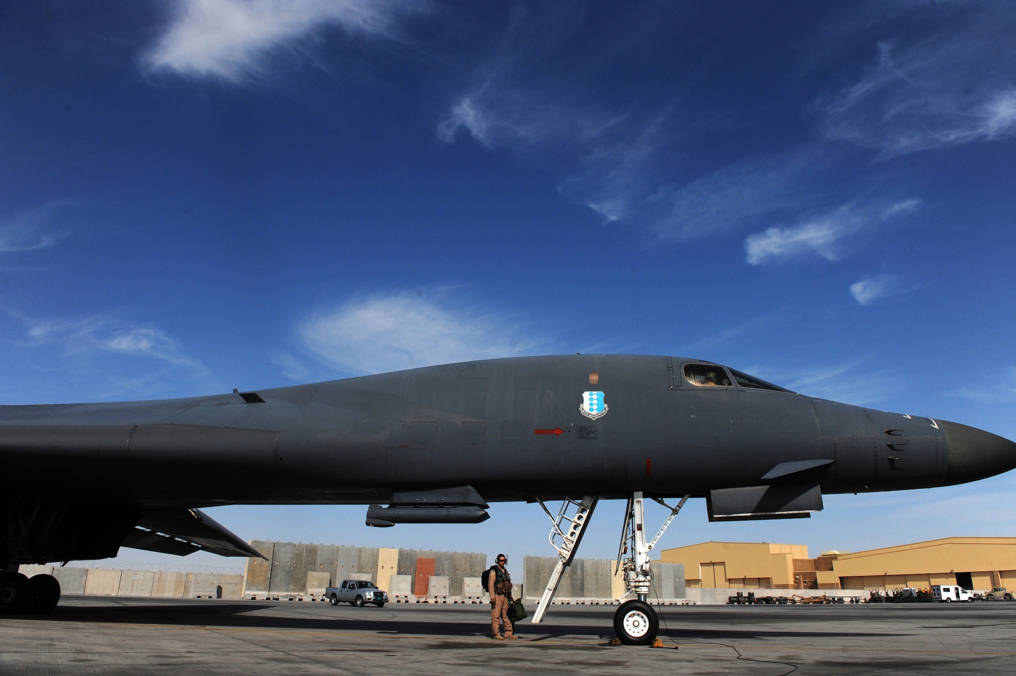 Maj. Nathan ''Gobot'' Rowan, a B-1B Lancer pilot assigned to the 37th Expeditionary Bomb Squadron, prepares to board a B-1B for the last mission of his deployment Jan. 23, 2010, in Southwest Asia. (U.S. Air Force photo/Staff Sgt. Manuel J. Martinez/Released)