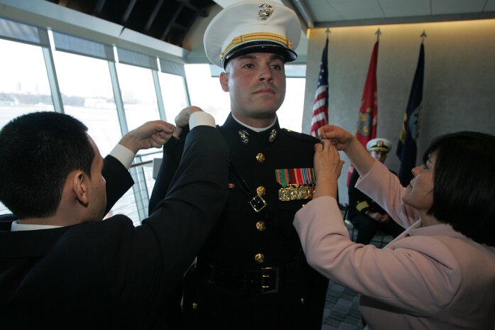 NEW YORK --  2nd Lt. Samy Cano, a Union, N.J., native, is commissioned a Marine Corps officer on USS Intrepid, here, Jan. 29. Cano, formerly a staff sergeant, previously served in the 9th Engineer Support Battalion at Marine Corps Base Camp Hansen, Okinawa, Japan. He earned his degree at State University of New York Maritime College through the Marine Corps Enlisted Commissioning Education Program.  In 2009, 150 enlisted Marines were selected to the program designed to provide outstanding enlisted Marines the opportunity to serve as Marine Corps officers.