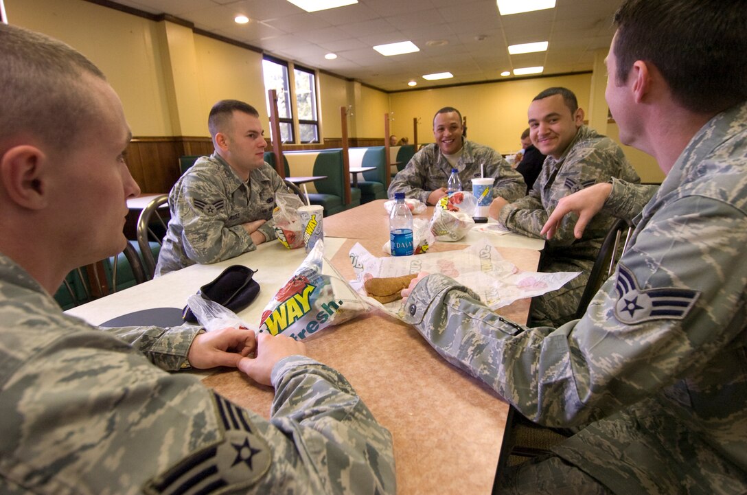 A group of 316th Security Forces Squadron members enjoy the Subway dining facility on the eastside of Joint Base Andrews Jan. 25, 2010. The facility was originally the Liberty Hall Dining Facility. The newly renovated Subway opened for business for all Joint Base Andrews Active Duty, Reserve, retirees and family Sept. 30, 2009. (U.S. Air Force photo by Bobby Jones)
