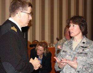 Air Force Lt. Col. Mary Carlisle, a critical care nurse, speaks with a colleague at the 2010 Military Health System Conference at the National Harbor in Prince George’s County, Md., Jan. 26, 2010. Carlisle spoke at the conference of her battle with post-traumatic stress disorder and her eventual healing. (Department of Defense photo by Elaine Wilson)