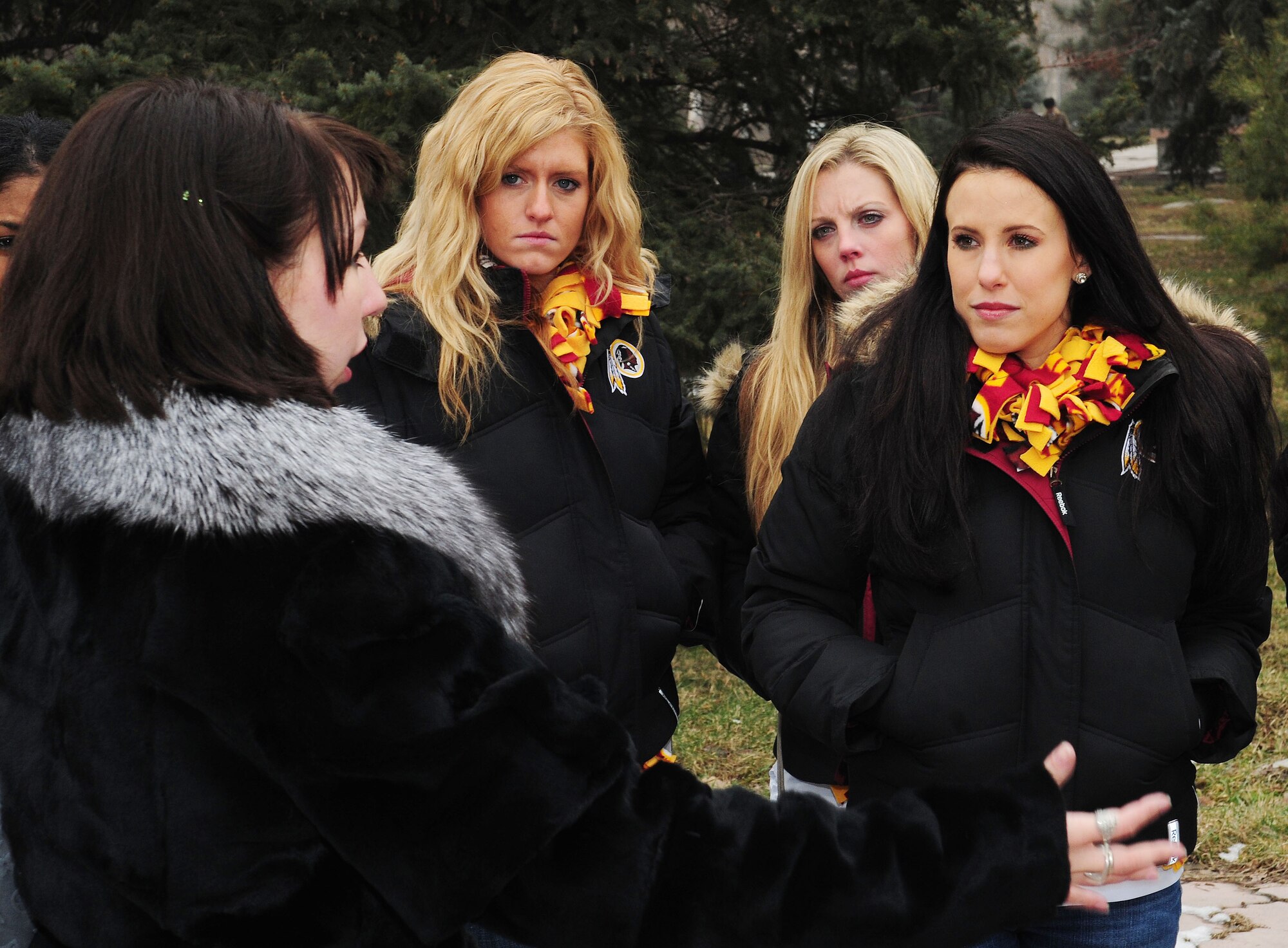 Senior Airman Maria Gates, 376th Air Expeditionary Wing translator and native of Kyrgyzstan, speaks of the history and culture of the land to the Washington Redskins cheerleaders on a tour of downtown Bishkek, Kyrgyzstan, Jan. 27, 2010. The cheerleaders are on tour sponsored by the Armed Forces Entertainment. The Transit Center at Manas is their first stop in a two-week long tour where they will perform for Airmen, Soldiers, Sailors and Marines deployed overseas. (U.S. Air Force photo/Senior Airman Nichelle Anderson/Released)
