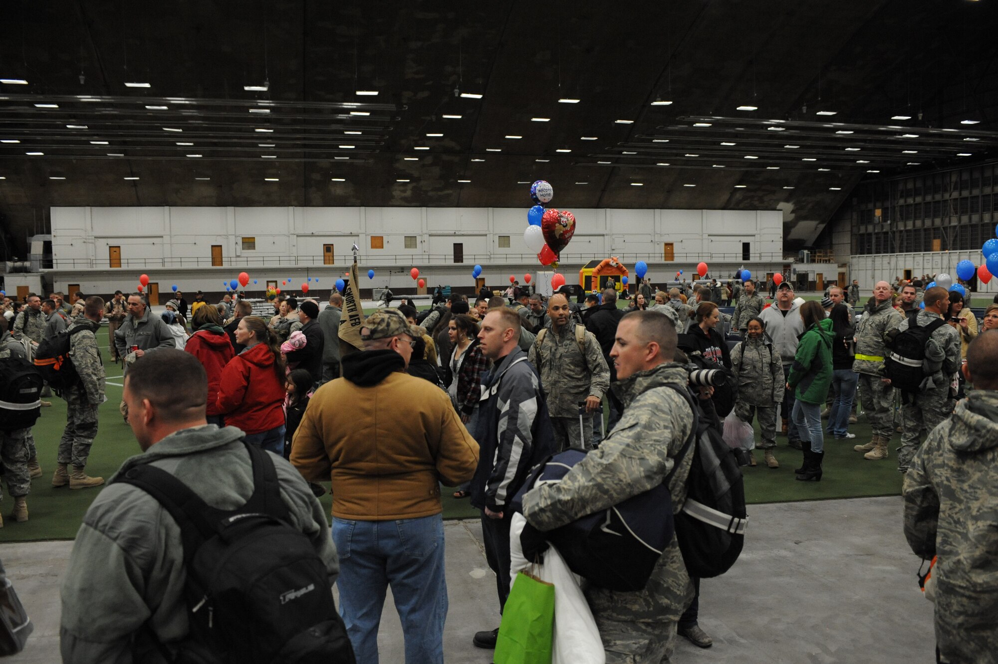 ELLSWORTH AIR FORCE BASE S.D.-- Family and friends greet Ellsworth Airmen returning from deployment, Jan. 30. Approximately 300 Airmen serving in various roles, deployed to support Operations Iraqi and Enduring Freedom. (U.S. Air Force photo/Airman 1st Class Corey Hook)