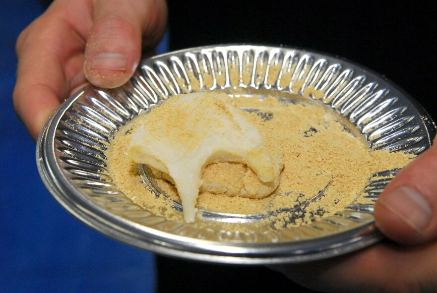 The final product takes the rice cake and adds a topping for flavoring. Mochi is a traditional food for the Japanese New Year and is commonly sold and eaten during that time. (U.S. Air Force photo / 1st Lt. Bryan Bouchard))