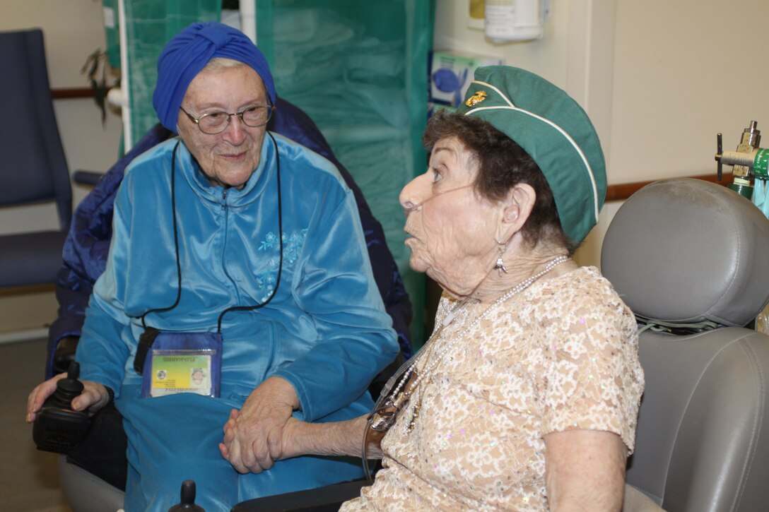 Shirley Kornegay (right), a former Marine, talks and reminisces with her friend, Flo Harris (left), also a former Marine, during her birthday celebration, Jan. 30.  Kornegay and Harris met and became friends when they met at the Veteran Home of California, Chula Vista, Calif.