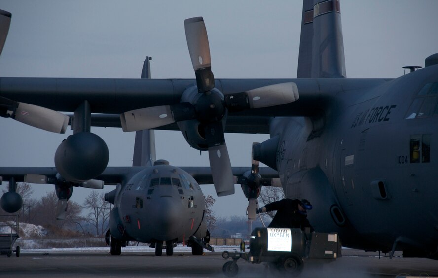 A C-130 Hercules from the 133rd Airlift Wing, Minnesota Air National Guard, receives a Liquid Oxygen refill on the tarmac at the Minneapolis St. Paul International Airport December 16, 2009. The aircraft  has 25 liter liquid oxygen (LOX) type system which provides for 96 man-hours of oxygen at 25,000 feet. The C-130 Hercules primarily performs the tactical portion of the airlift mission. The
 aircraft is capable of operating from rough, dirt strips and is the prime transport for air dropping troops and equipment into hostile areas. United States Air Force photo by Tech Sgt Erik Gudmundson (Released)