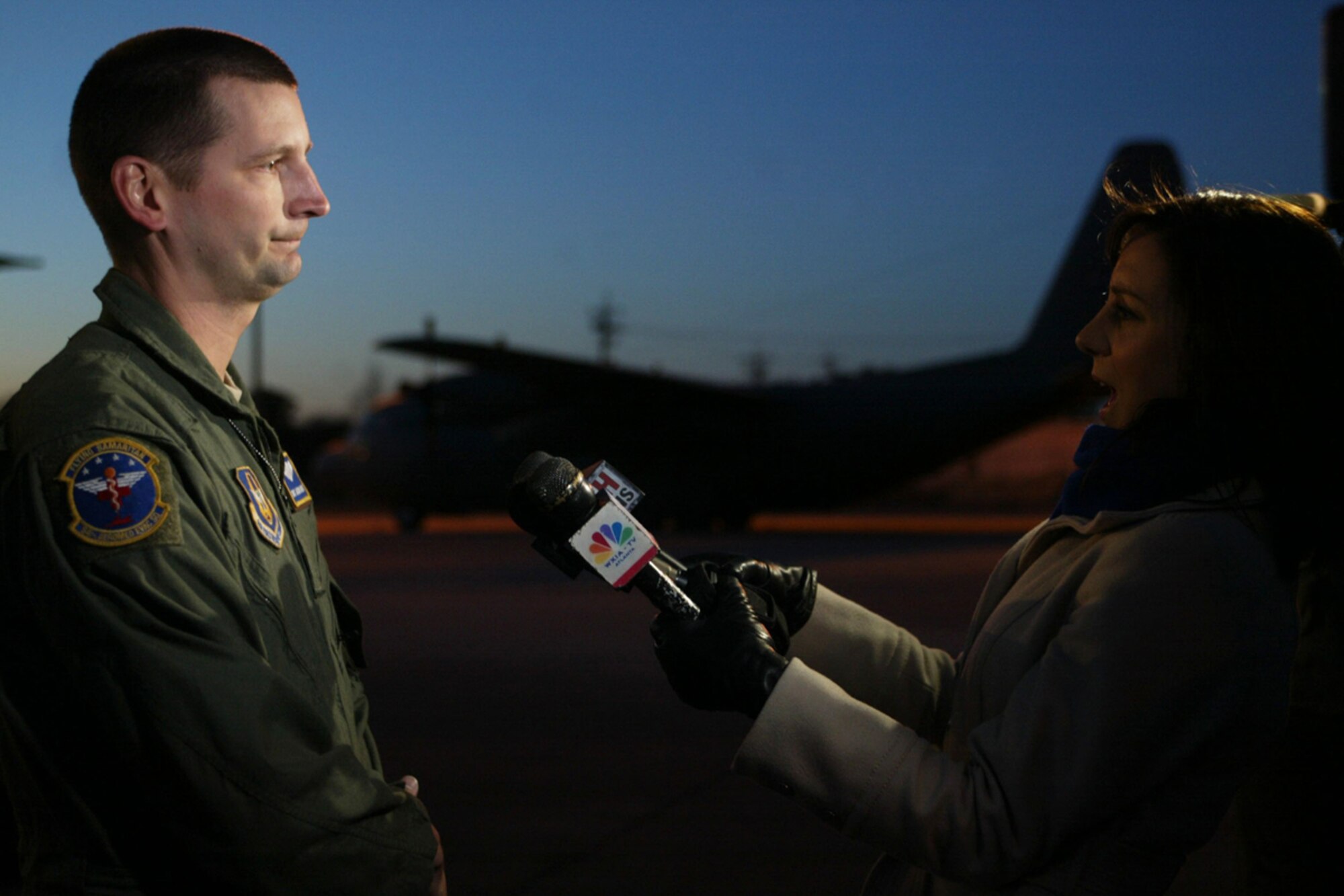During an interview with local media, Tech. Sgt. Jason L. Wade, 94th Aeromedical Evacuation Squadron medical technician, describes the experience he encountered while providing critical medical assistance to Haitians in support of Operation Unified Response. The medical crew returned Jan. 31 after a two-week deployment. (U.S. Air Force photo/Don Peek)