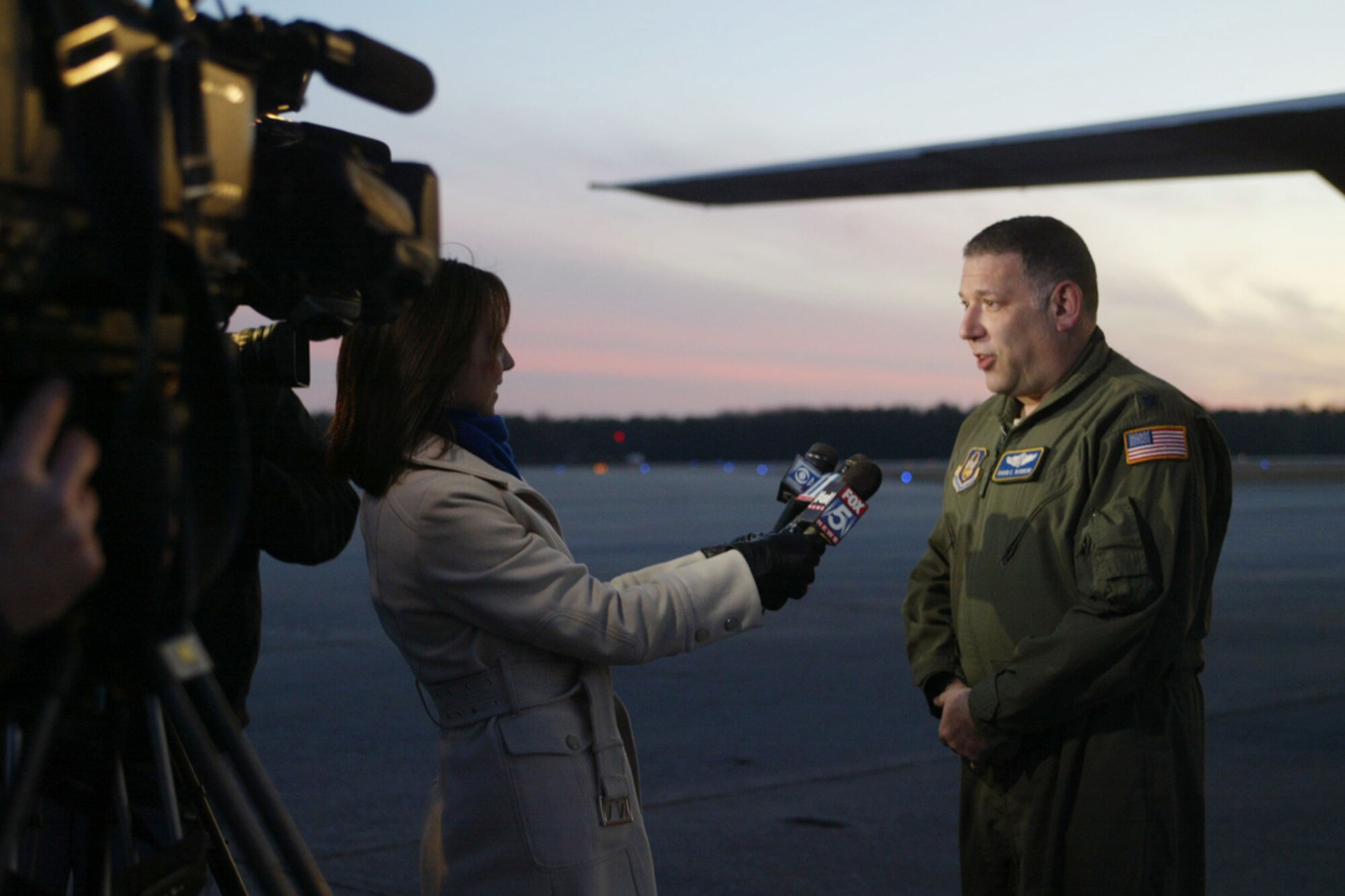 During an interview with local media, Lt. Col. David E. Rodberg, 94th Aeromedical Evacuation Squadron medical crew director, describes the experience he and his crew encountered while providing critical medical assistance to Haitians in support of Operation Unified Response. The medical crew returned to Dobbins Jan. 31 after a two-week deployment. (U.S. Air Force photo/Don Peek)