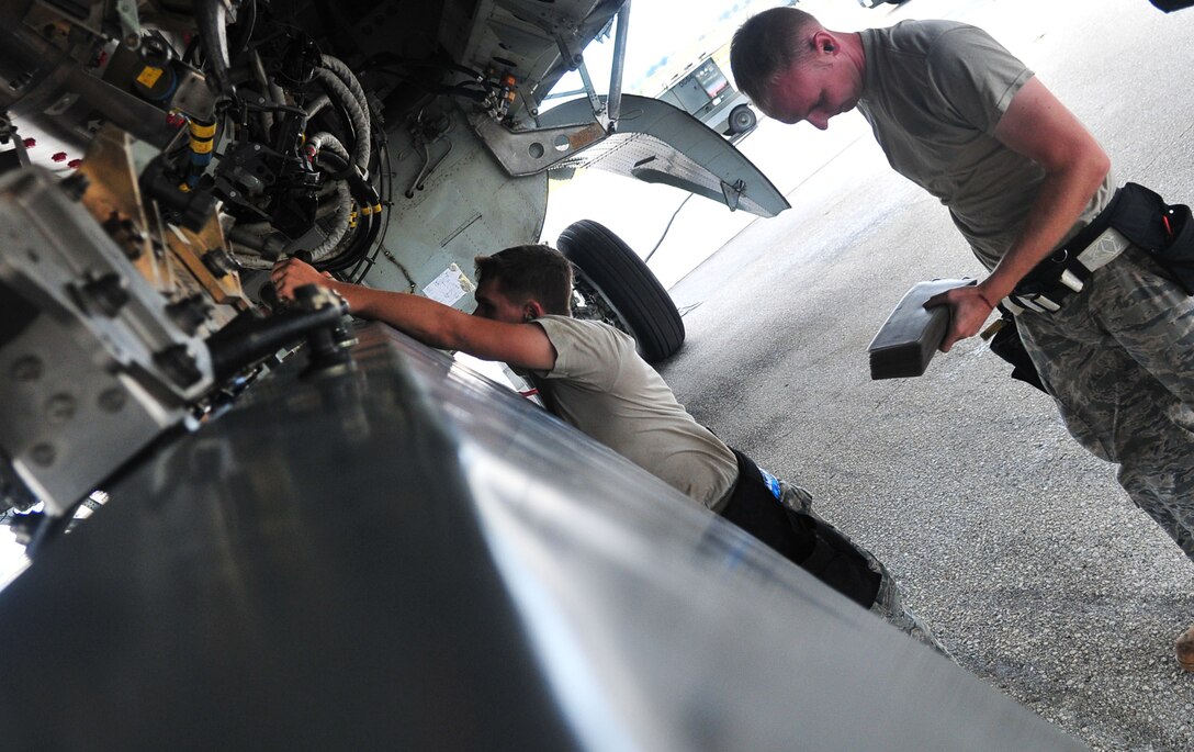 ANDERSEN AIR FORCE BASE, Guam - Airmen from the 36th Expeditionary Aircraft Maintenance Squadron load a conventional air launch cruise missile onto a B-52 during a recent operational readiness exercise here.  The Airmen are deployed to the 36th Wing from the 2nd Aircraft Maintenance Squadron, Barksdale AFB, La., as part of U.S. Pacific Command's continuous bomber presence. The mission of the 36th Wing is to employ, deploy, integrate and enable air and space forces from the most forward U.S. sovereign Air Force base in the Pacific.  (U.S. Air Force photo by Airman 1st Class Julian North)