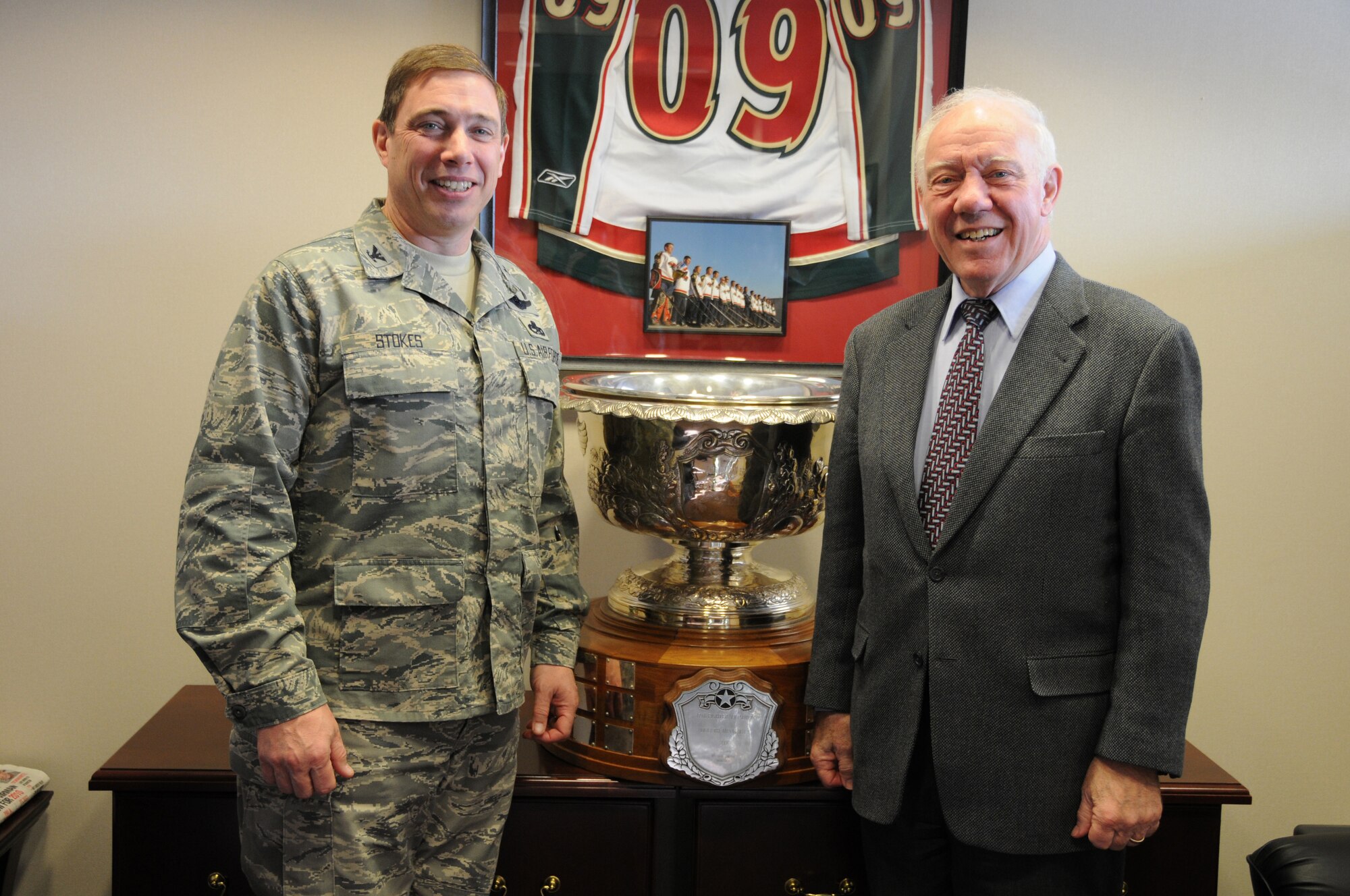 Colonel Frank Stokes, Wing Commander of the 148th Fighter Wing in Duluth, MN poses with Minnesota Congressman Jim Oberstar in front of the prized Raytheon Corporation Trophy. The Raytheon Trophy was awarded to the 179th Fighter Squadron of the 148th Fighter Wing, for being the most outstanding air defense unit in the U.S. Air Force, marking only the fourth time an Air National Guard unit receieved this award since its inception in 1953. (U.S. Air Force photo by Tech. Sgt. Brett R. Ewald)