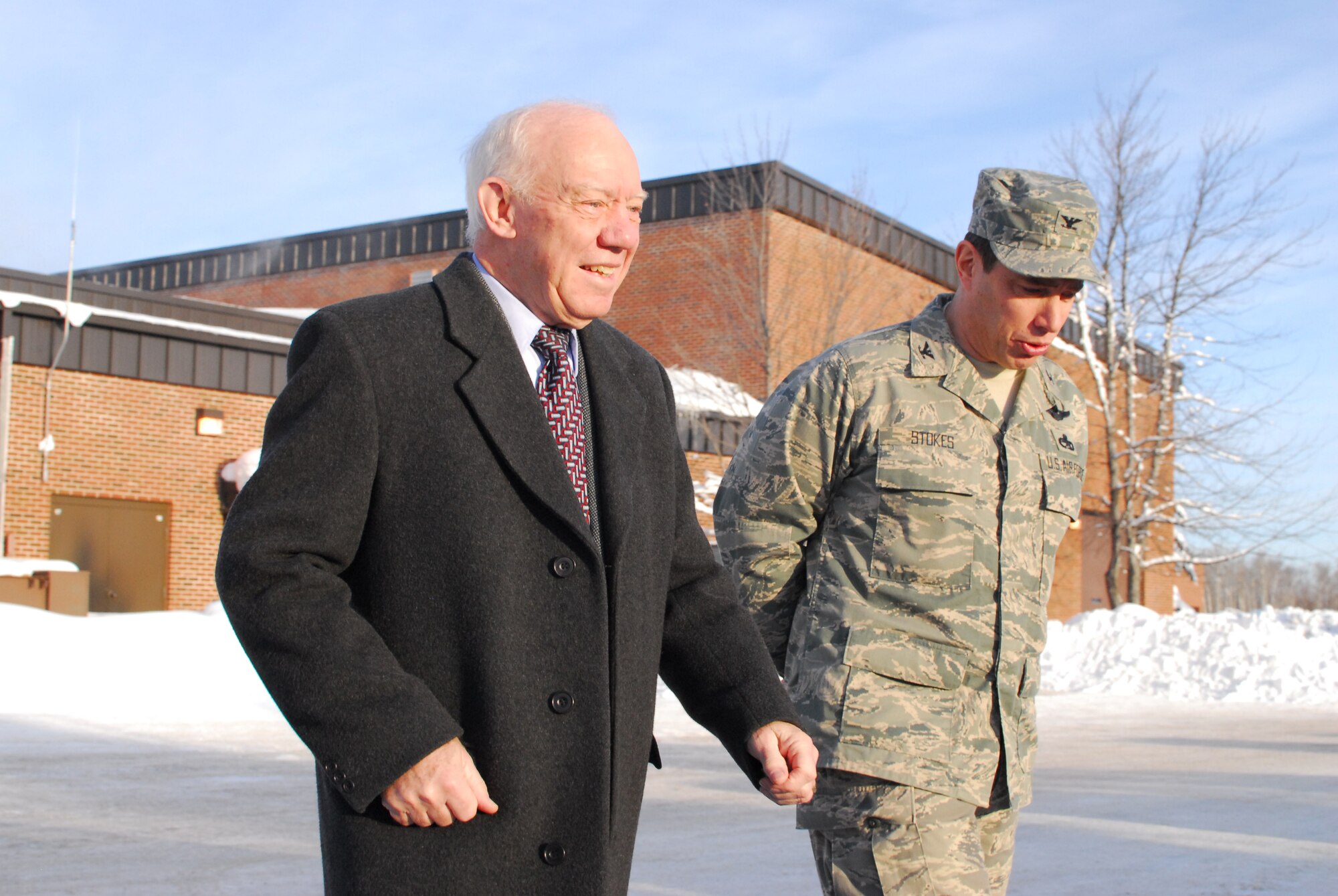 U.S. Air Force Colonel Frank Stokes, Wing Commander of the 148th Fighter Wing in Duluth, Minn. discusses with Congressman Jim Oberstar, the deployment of several members of the 148th to Hickam Air Force Base in Honolulu, Hawaii, Jan. 30th, 2010 . Oberstar visited the wing to discuss the future operations of the 148th and was able to speak with and encourage airmen as they prepare to deploy. (U.S. Air Force photo by Tech. Sgt. Brett R. Ewald)