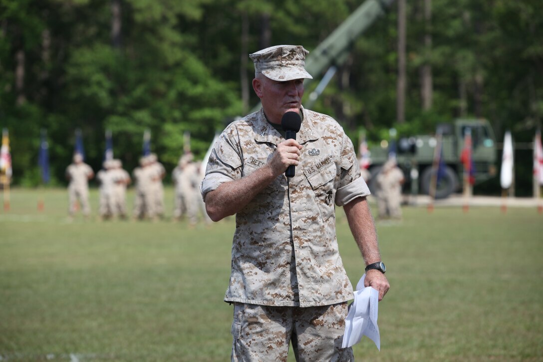 Col. David S. Heesacker, commanding officer of Marine Corps Engineer School, Marine Corps Base Camp Lejeune, gives a speech during his retirement ceremony at Courthouse Bay aboard the base, July 1.  Heesacker is retiring from the Marine Corps after 32 years of active-duty service and thanked the people who played a part in his life and career.