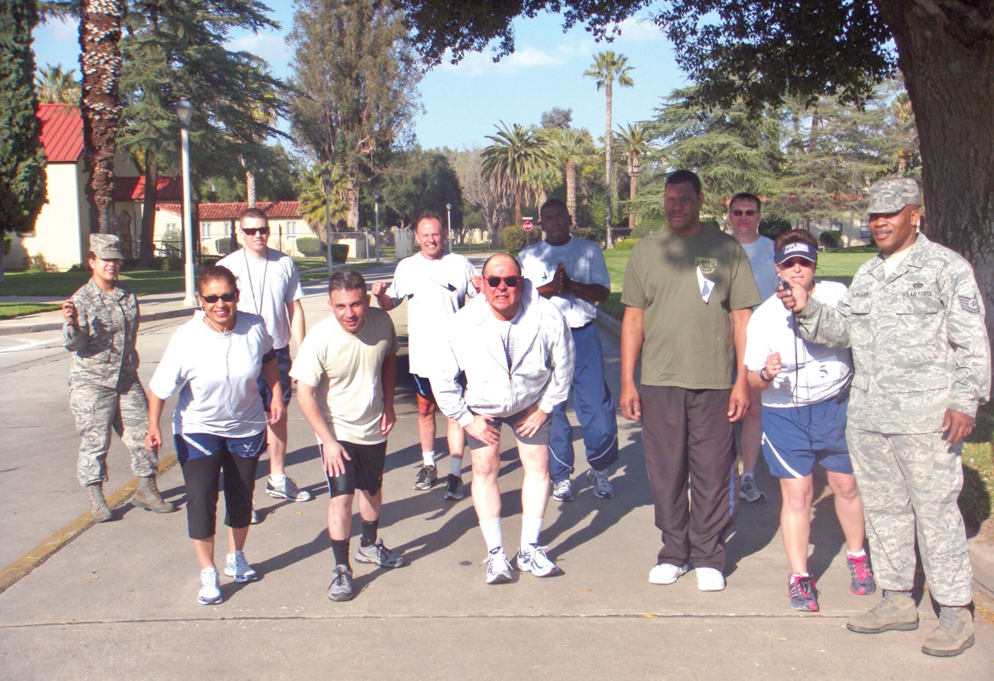 The participants in the first Fit-2-Fight-AThon prepare to start the running portion of the event. (U.S. Air Force photo)
