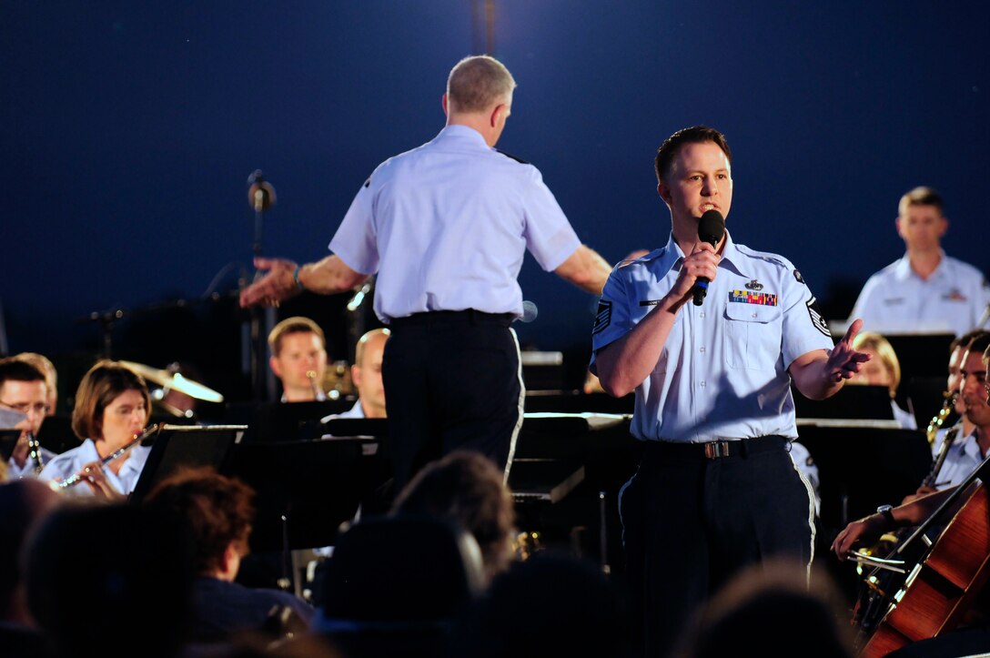Master Sgt. Bradley Bennett, United States Air Force Band Singing Sergeants, performs at the Air Force Memorial as part of the Summer Concert Series June 18. The Band’s six performing ensembles take turns performing throughout the summer at the Air Force Memorial each Wednesday and Friday with no fee for attendance. This Summer Series concert was the new Air Force Band commander’s first public concert with the Band. Lt. Col. A. Phillip Waite assumed command of the Air Force Band in a change-of-command ceremony June 1. (U.S. Air Force photo by Staff Sgt. Raymond Mills)