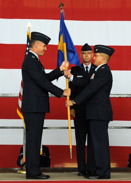 DYESS AIR FORCE BASE, Texas – Col. Todd G. McCready assumes command of the 7th Maintenance Group during a change of command ceremony June 30 at the 3-Bay Hangar here. Colonel McCready received his commission in 1987 through the Reserve Officer Training Corps. He is a career aircraft maintenance officer who briefly cross trained into transportation. (U.S. Air Force Photo/Airman 1st Class Chelsea Cummings)